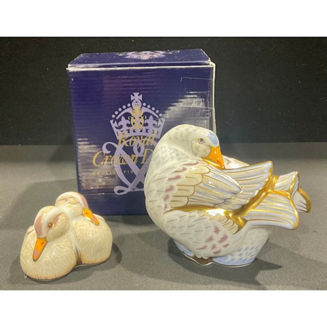 A Royal Crown Derby paperweight family group, Designers' Cho...