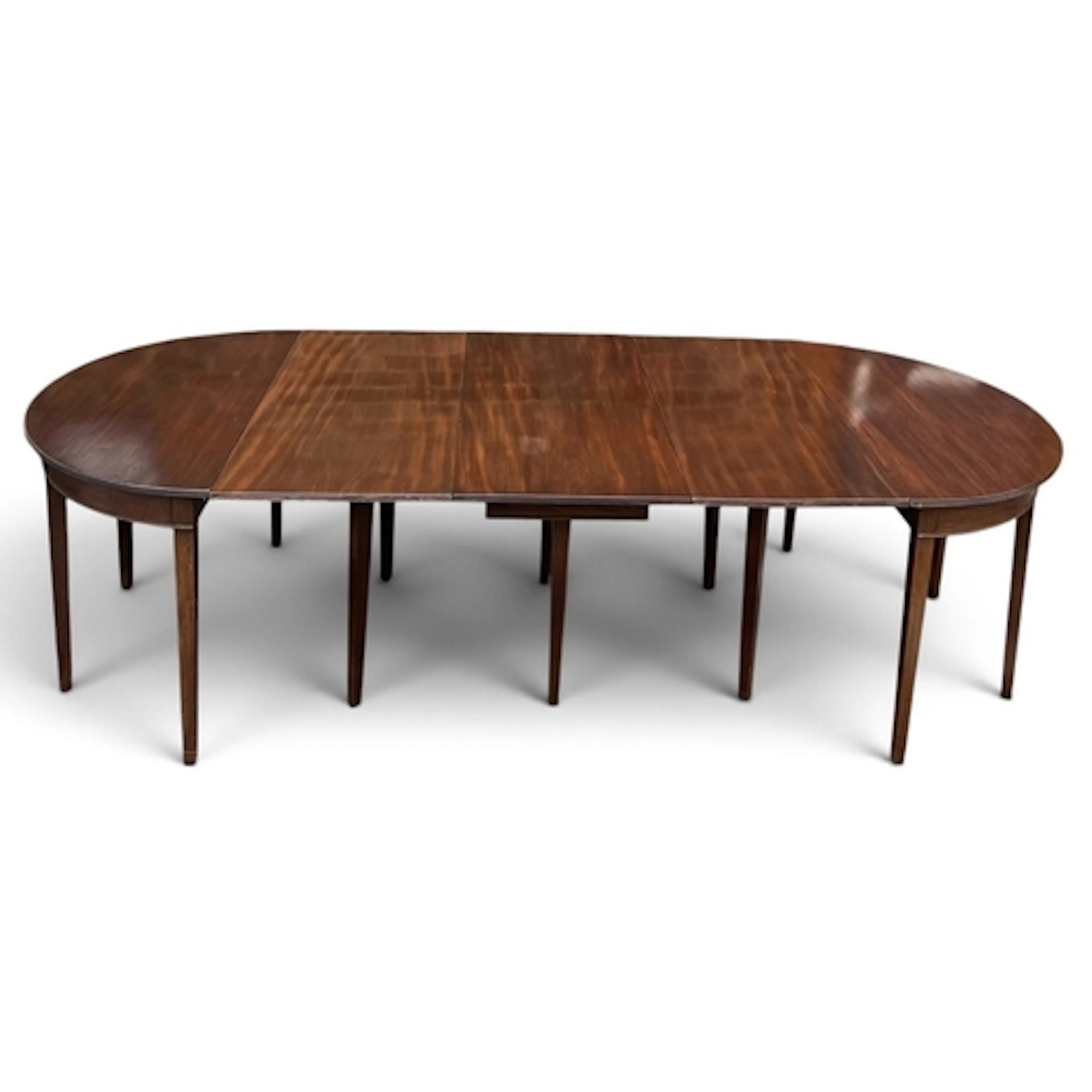 A MAHOGANY GATE-LEG DINING TABLE WITH TWO ADDITIONAL LEAVES ...
