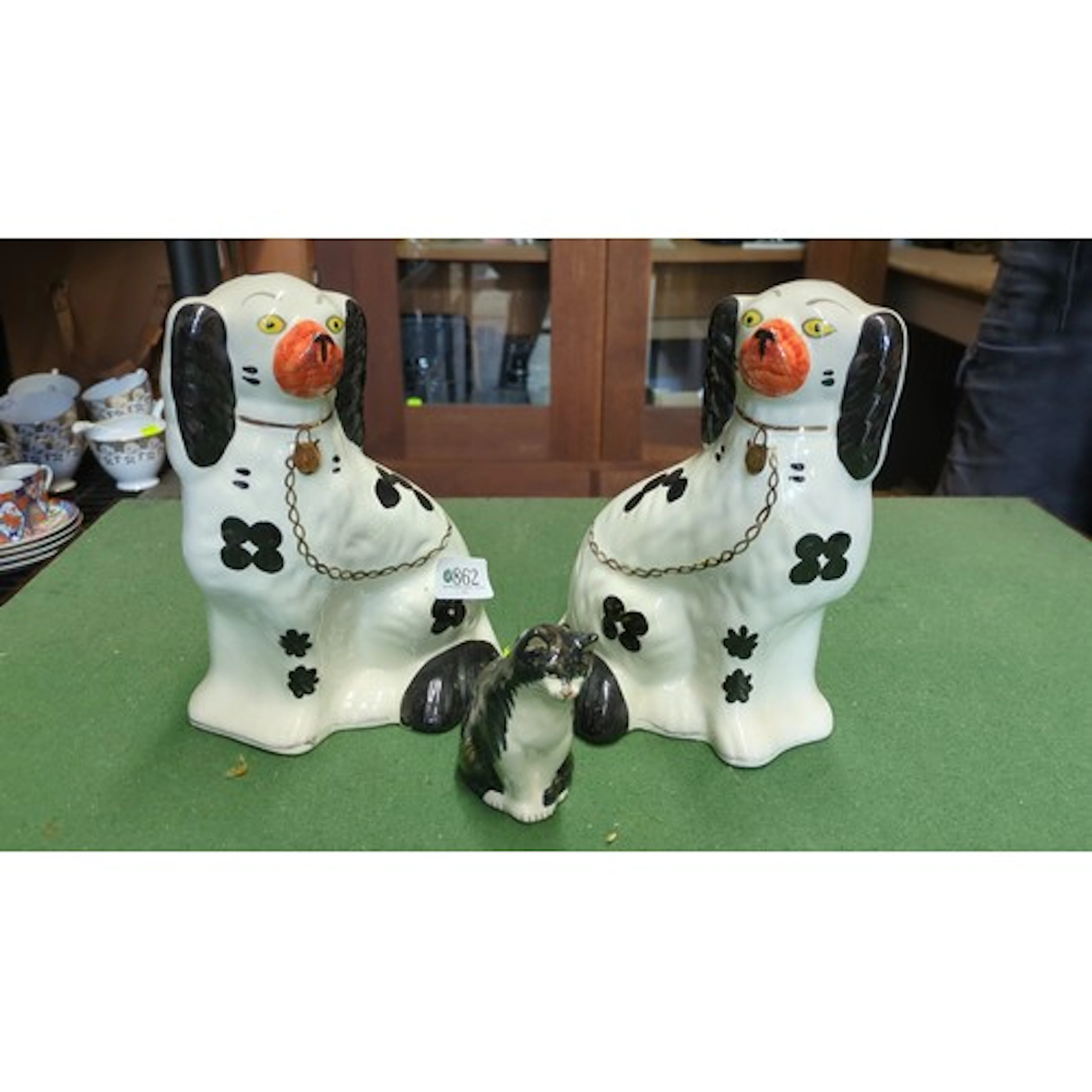 Arthur Wood, England—pair of glazed earthenware seated spani...