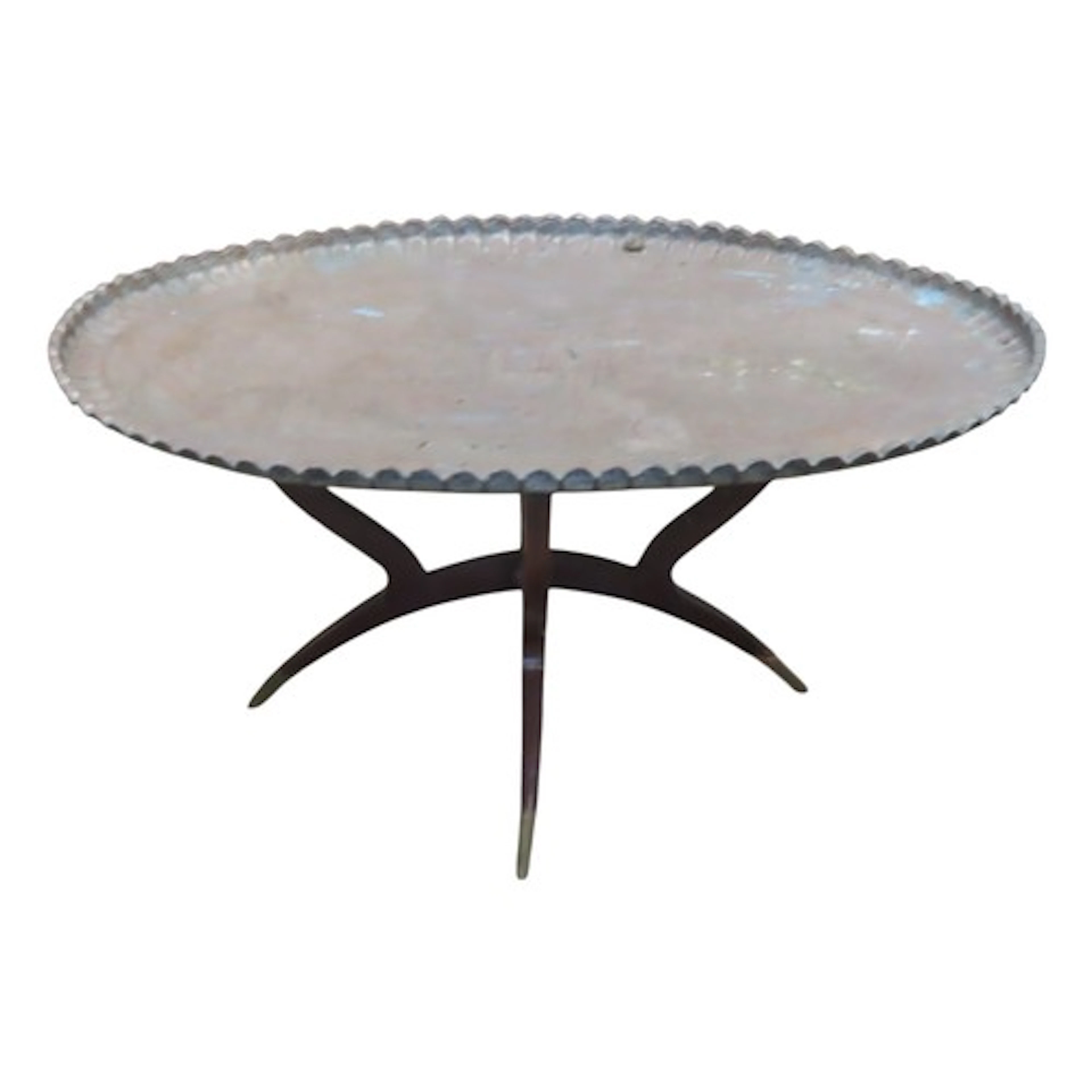 A large Indian engraved oval tray with scalloped edge raised...