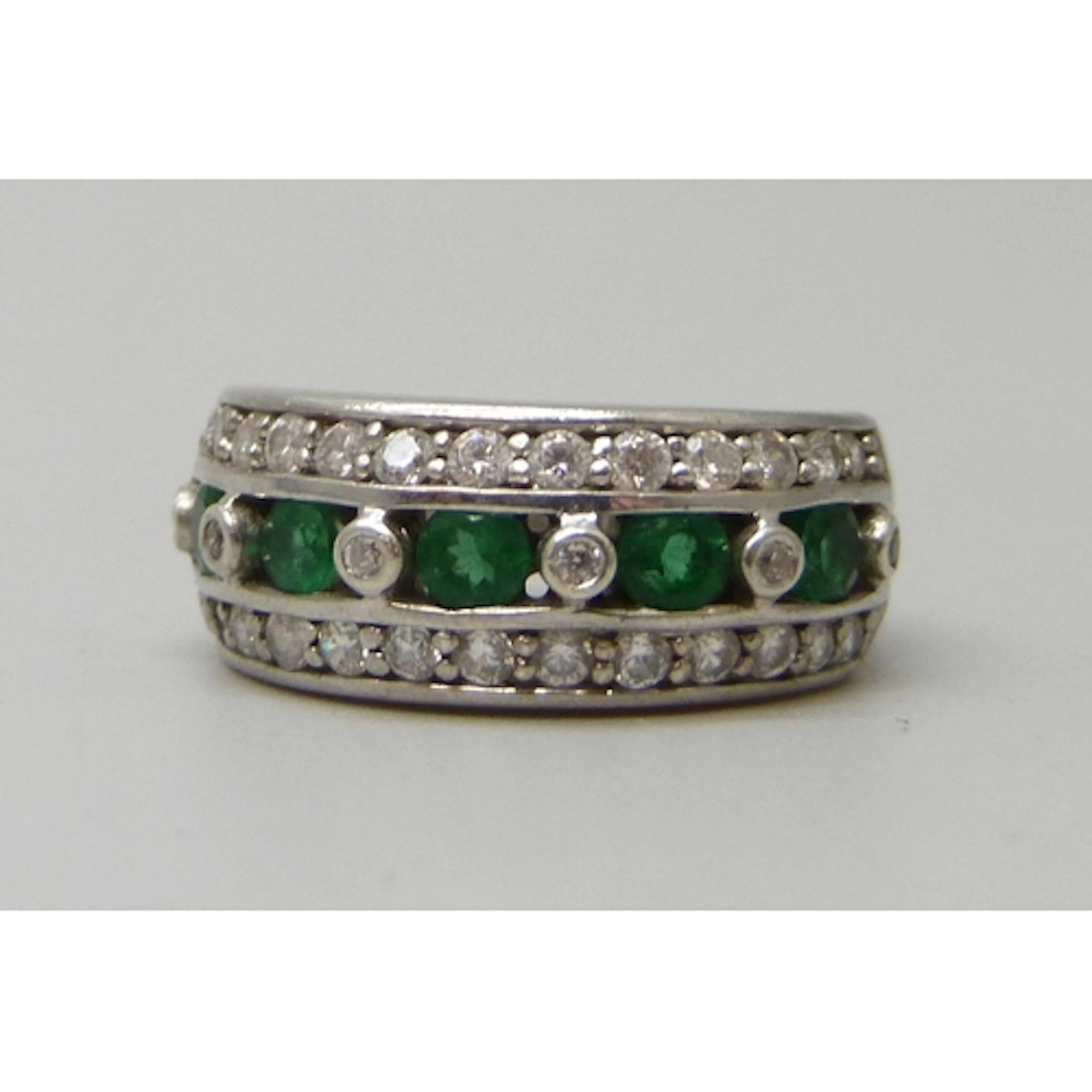 A silver, green stone and cubic zirconia ring, L