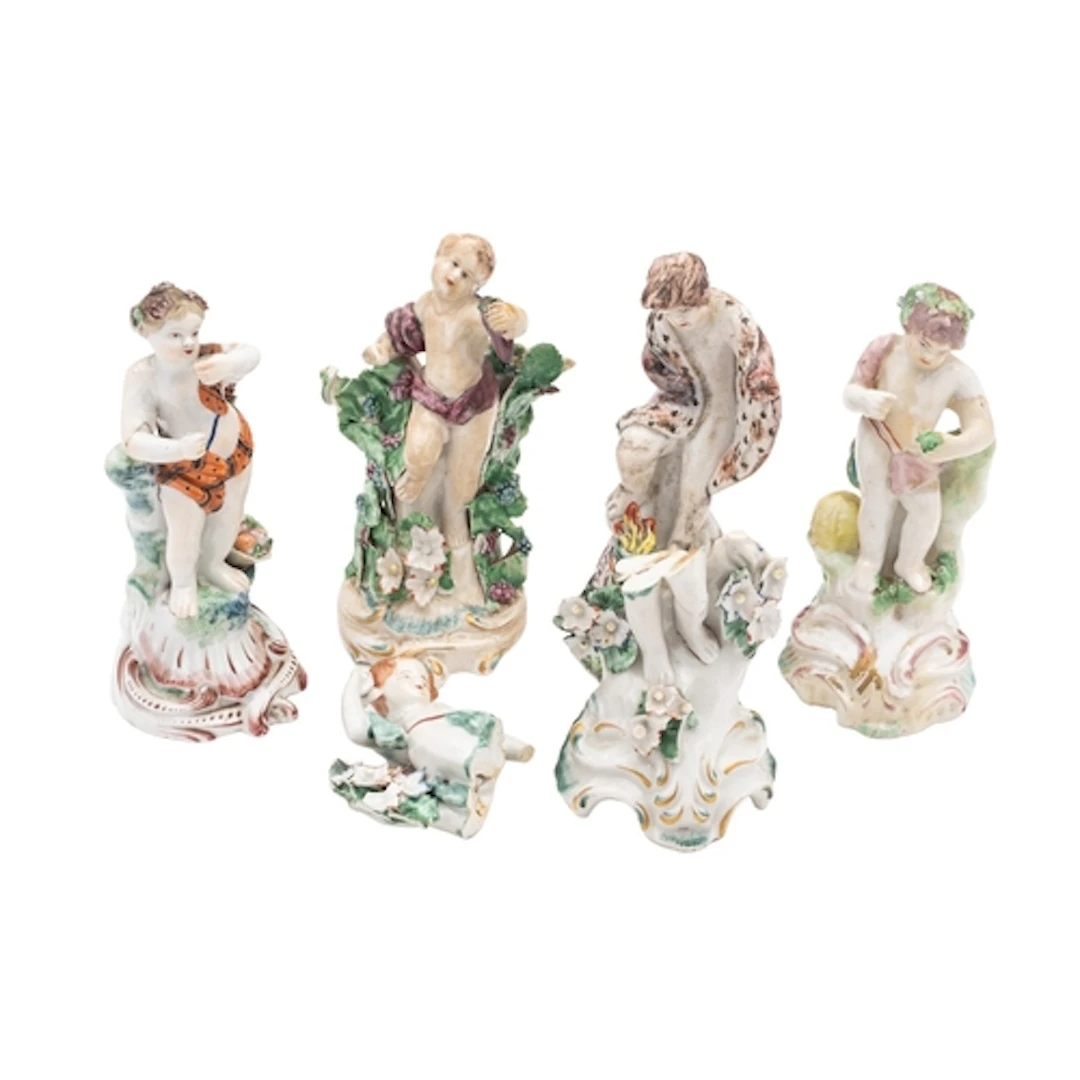 A composite set of four Plymouth figures of putti emblematic...