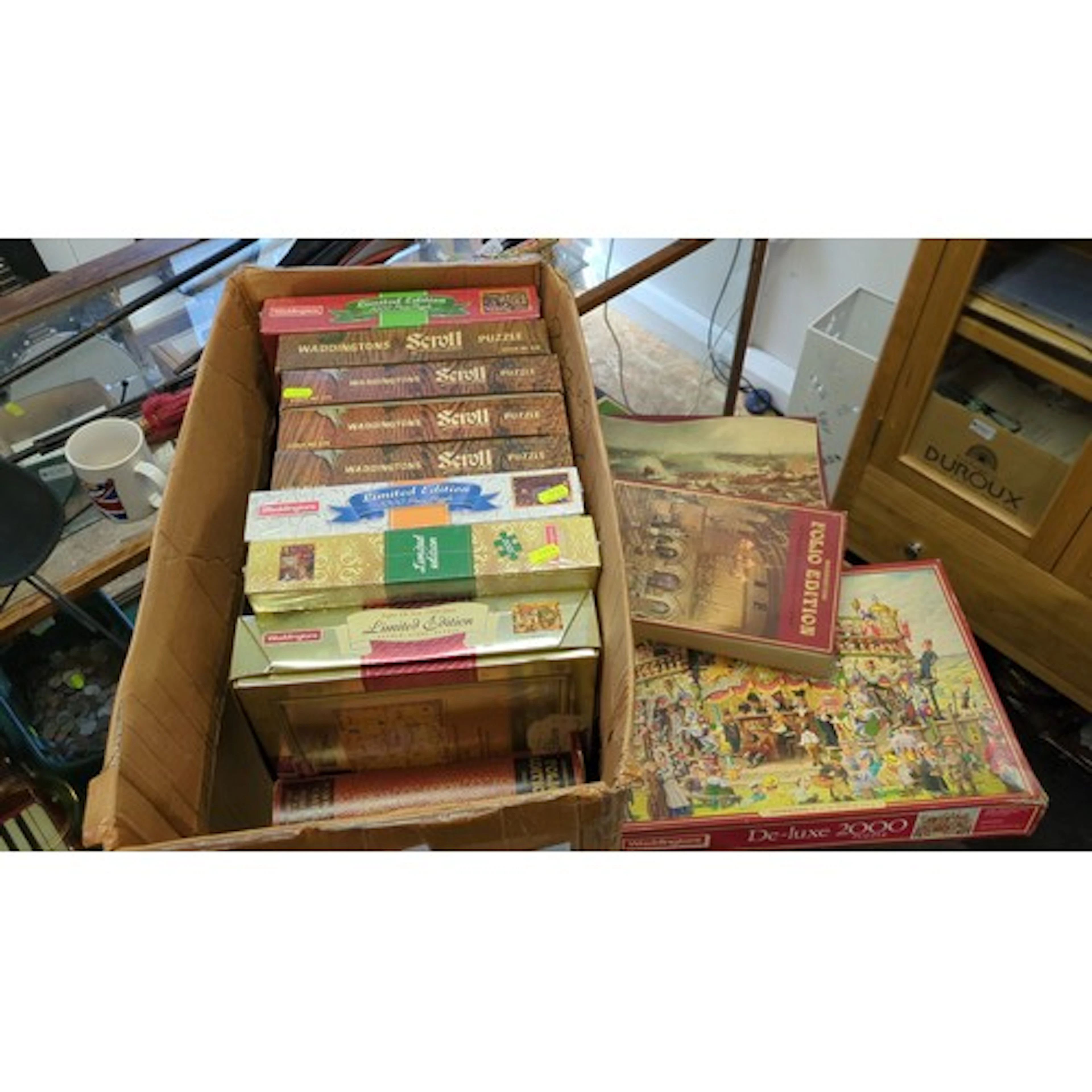 A group of Waddingtons jigsaw puzzles, including Scroll seri...