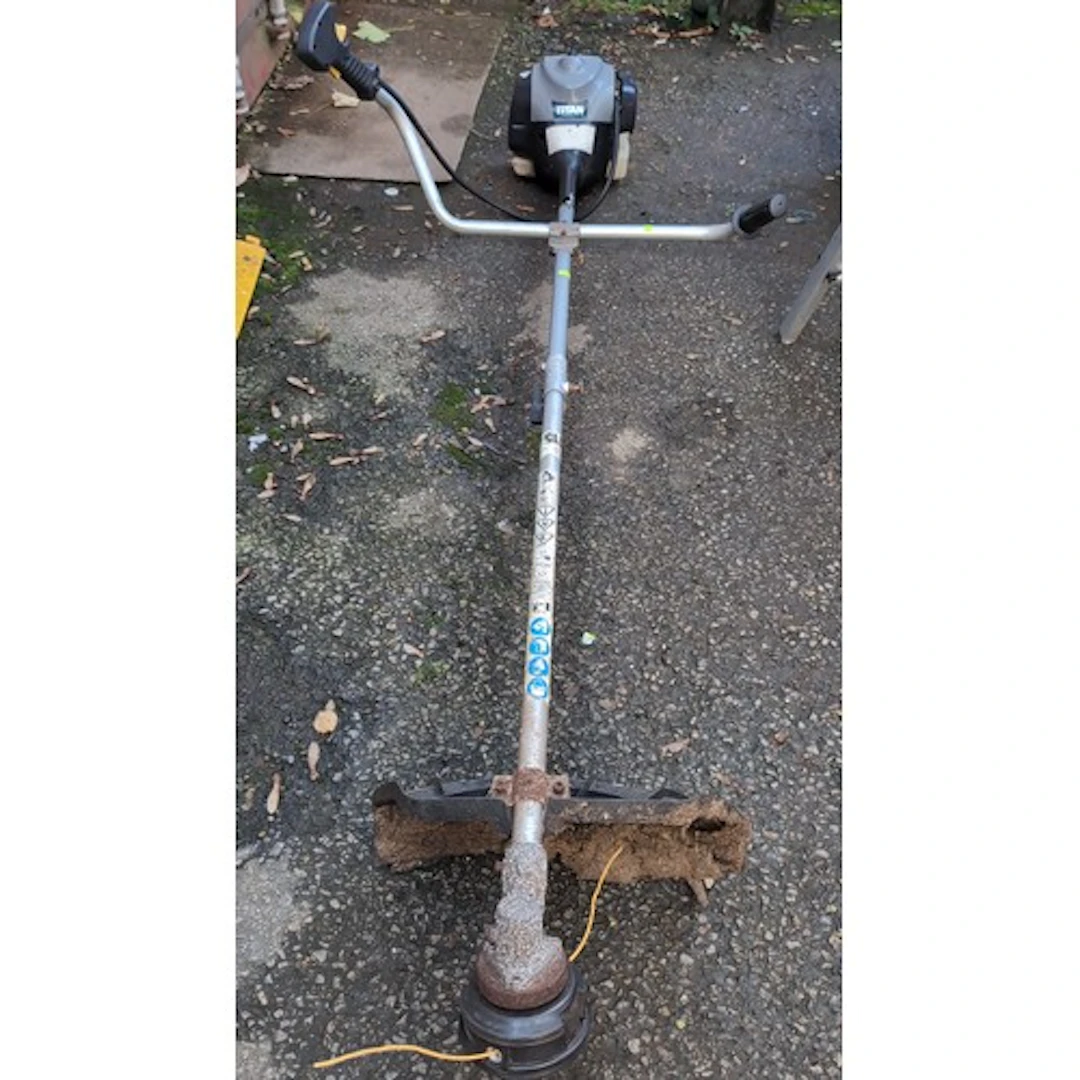 Titan TTL530GBC petrol brush cutter with a 43cc engine, stra...