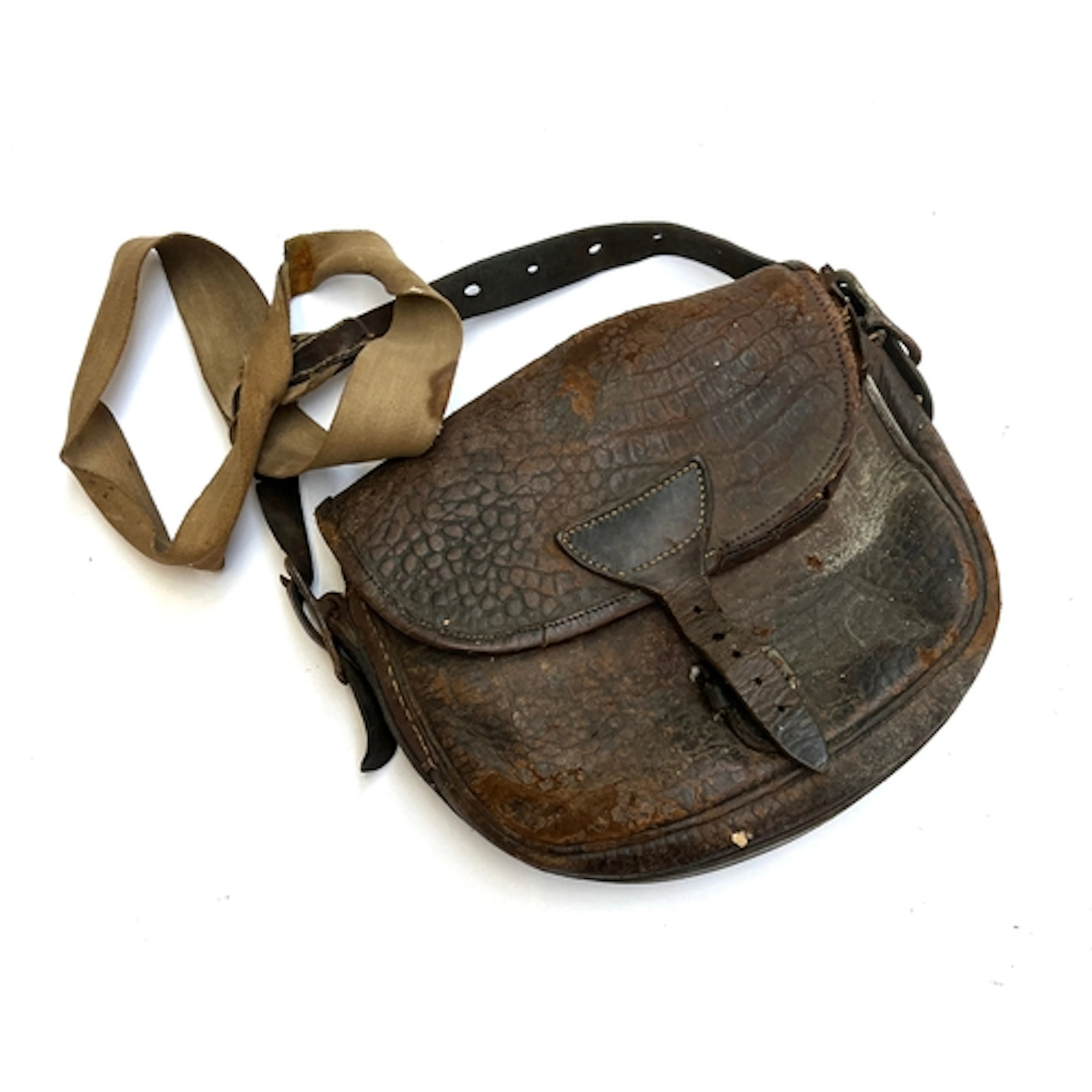 A vintage leather and canvas cartridge bag, approx. 27cm wid...