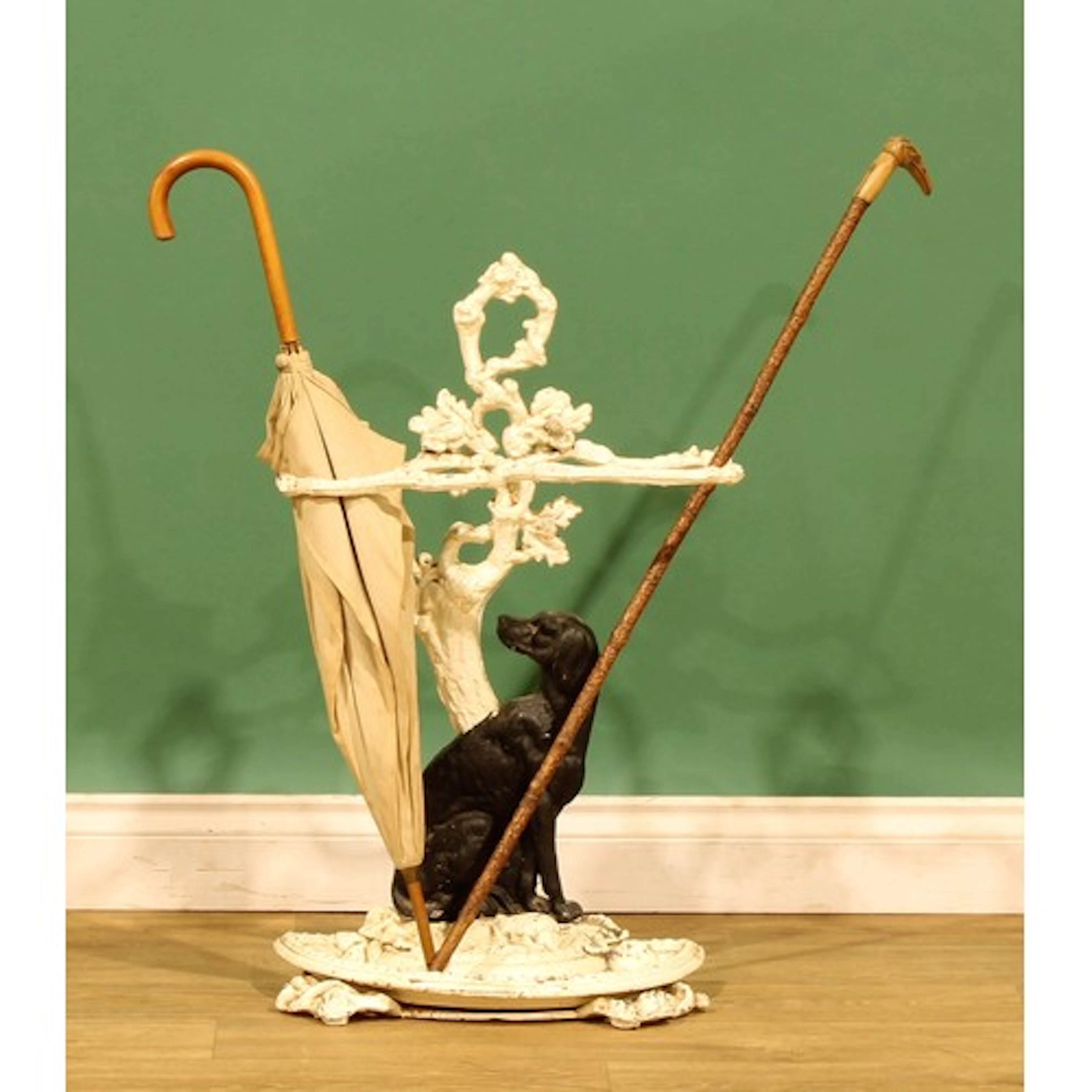 A Victorian cast iron umbrella or walking stick stand, cast ...
