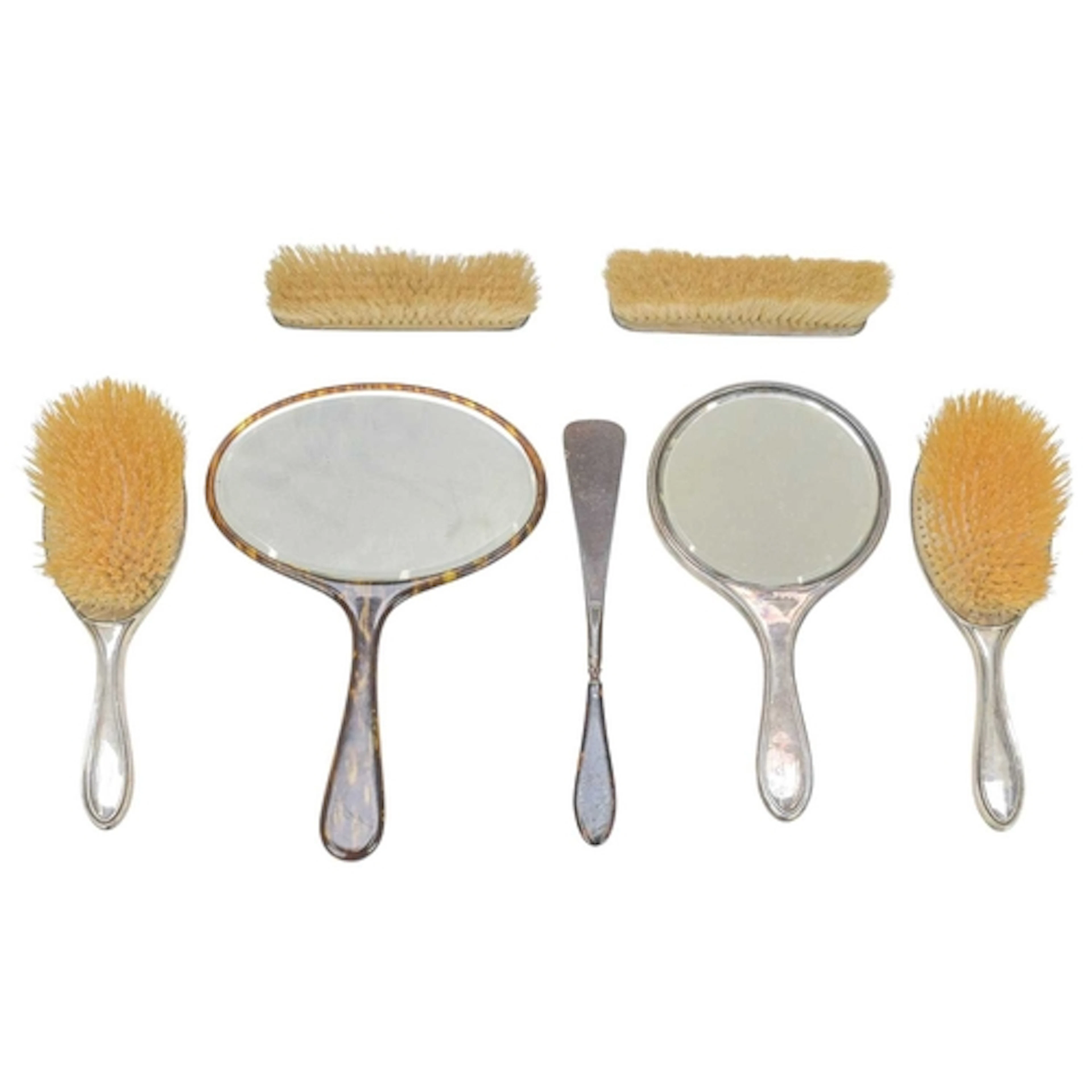 A silver and tortoiseshell dressing table set. Hallmarked fo...