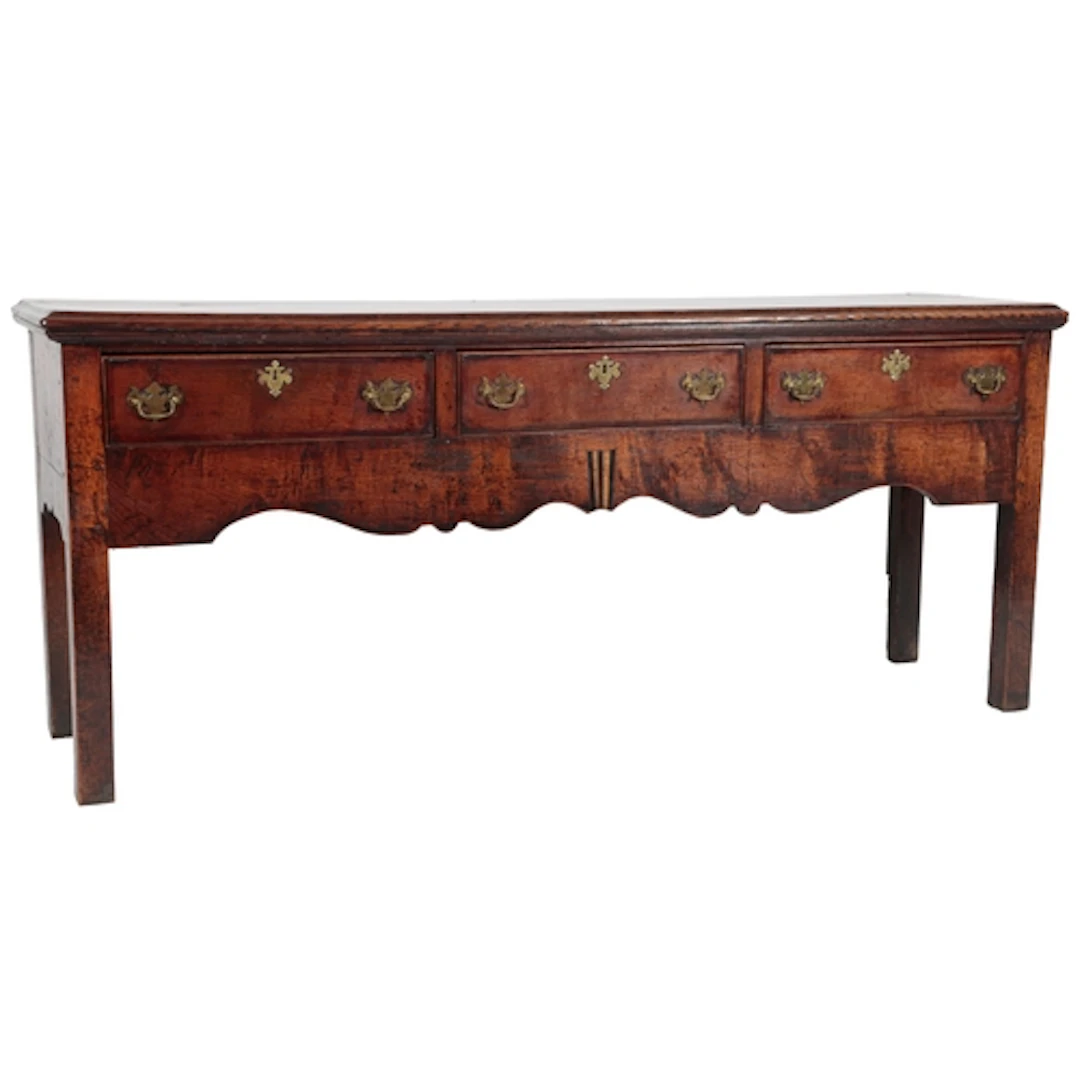An oak and walnut crossbanded low dresser, mid-18th century,...