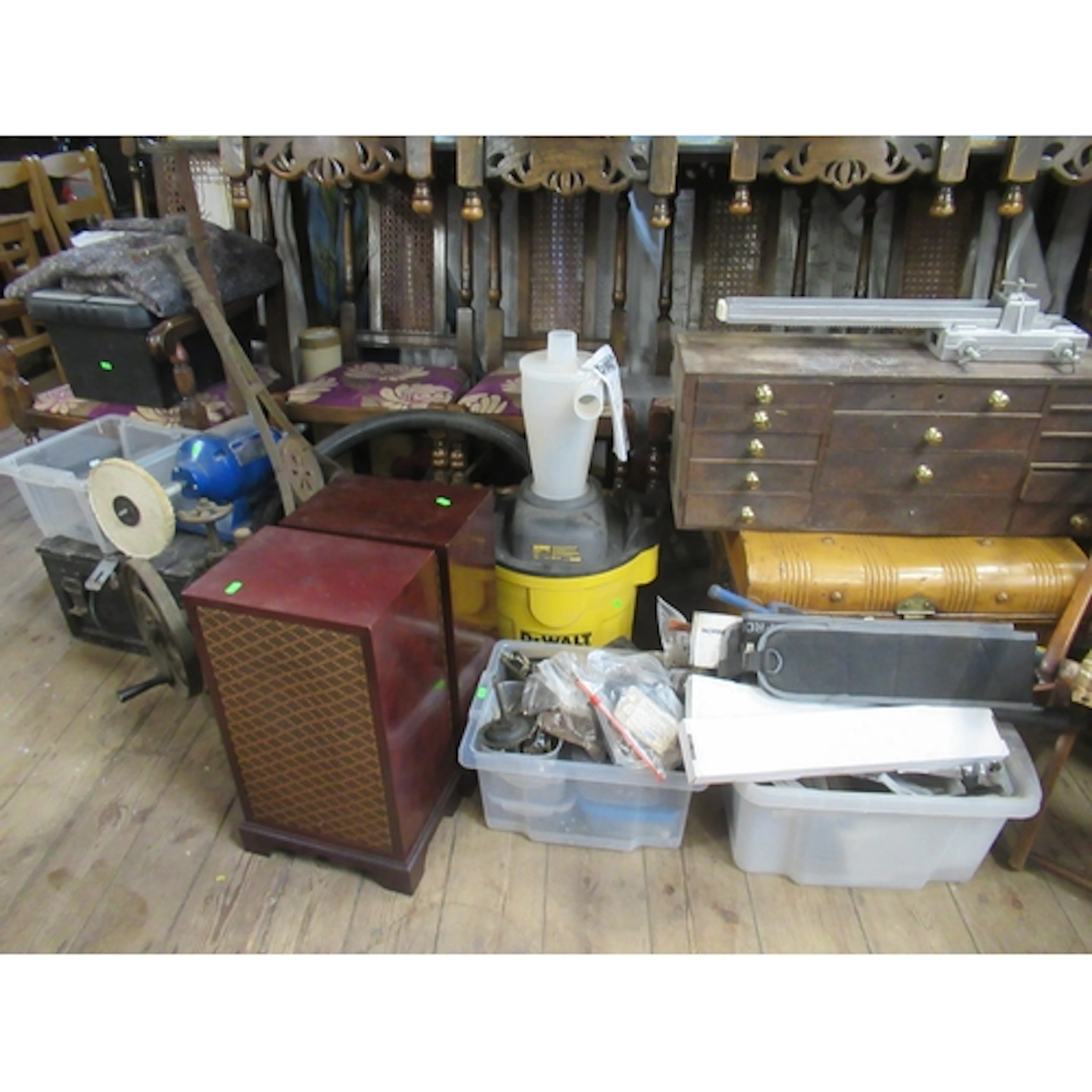 A collection of items, to include tools, tin trunk, wooden d...