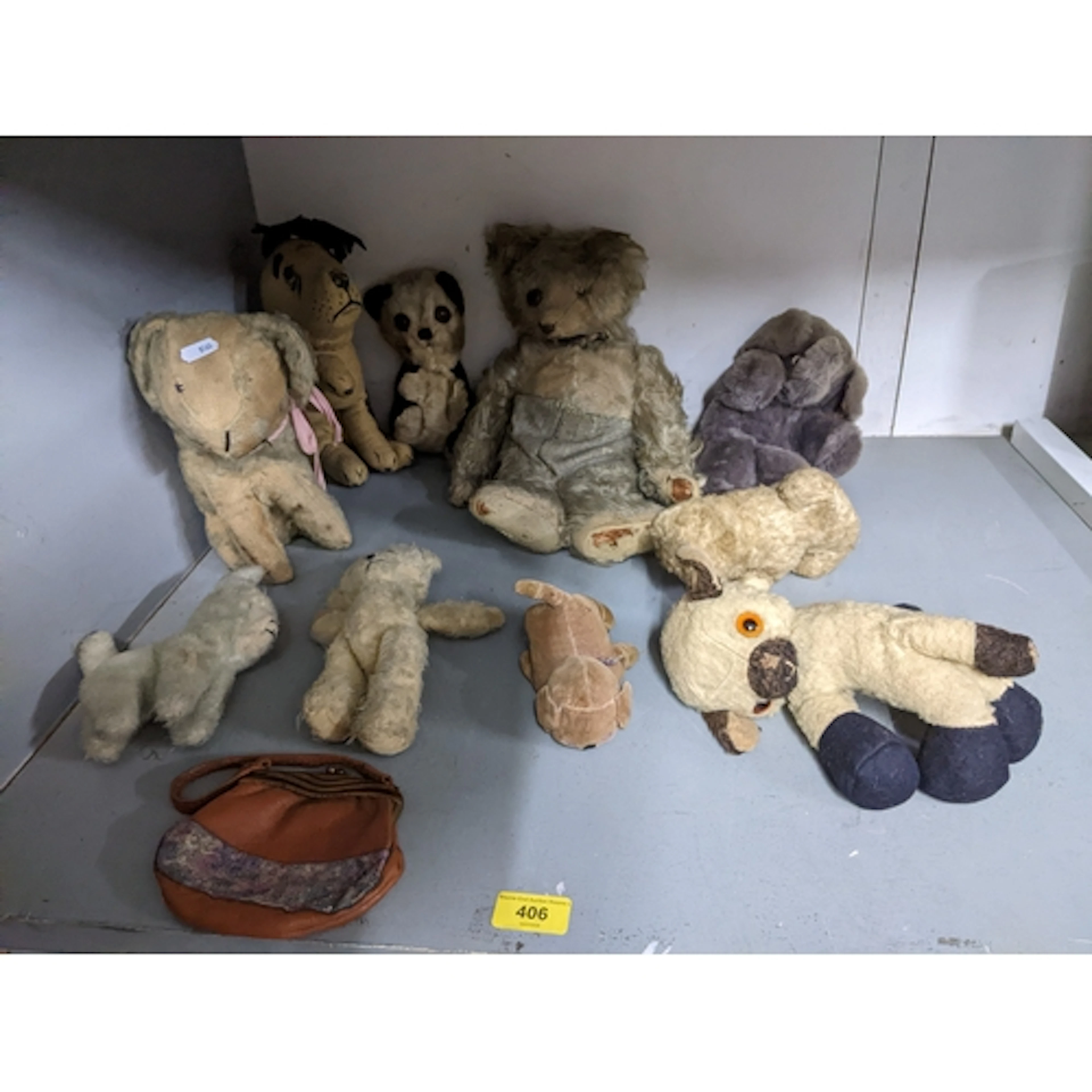 A mixed group of vintage soft toys to include a possible J K...