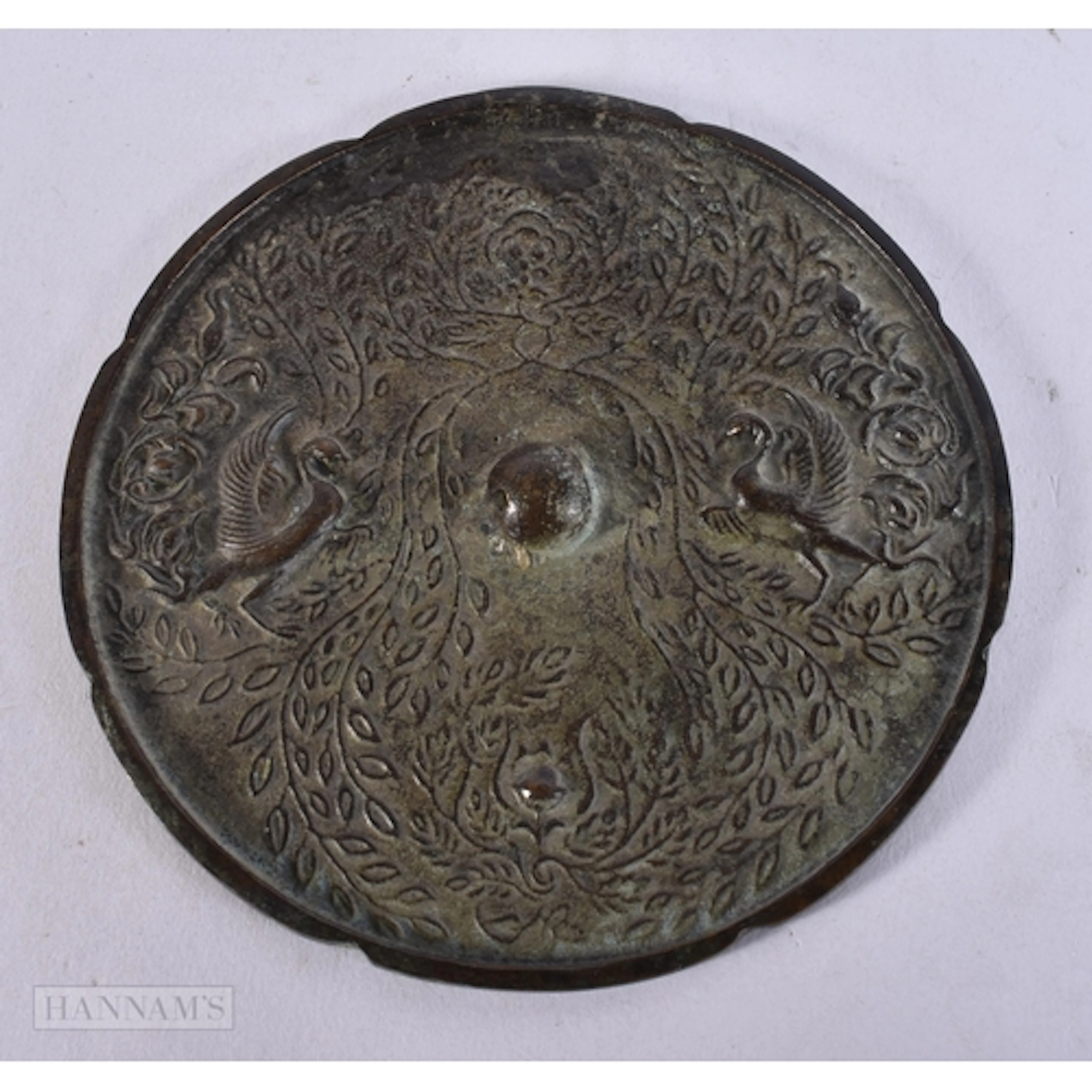 A CHINESE BRONZE HAND MIRROR probably Tang Dynasty (AD 618-9...