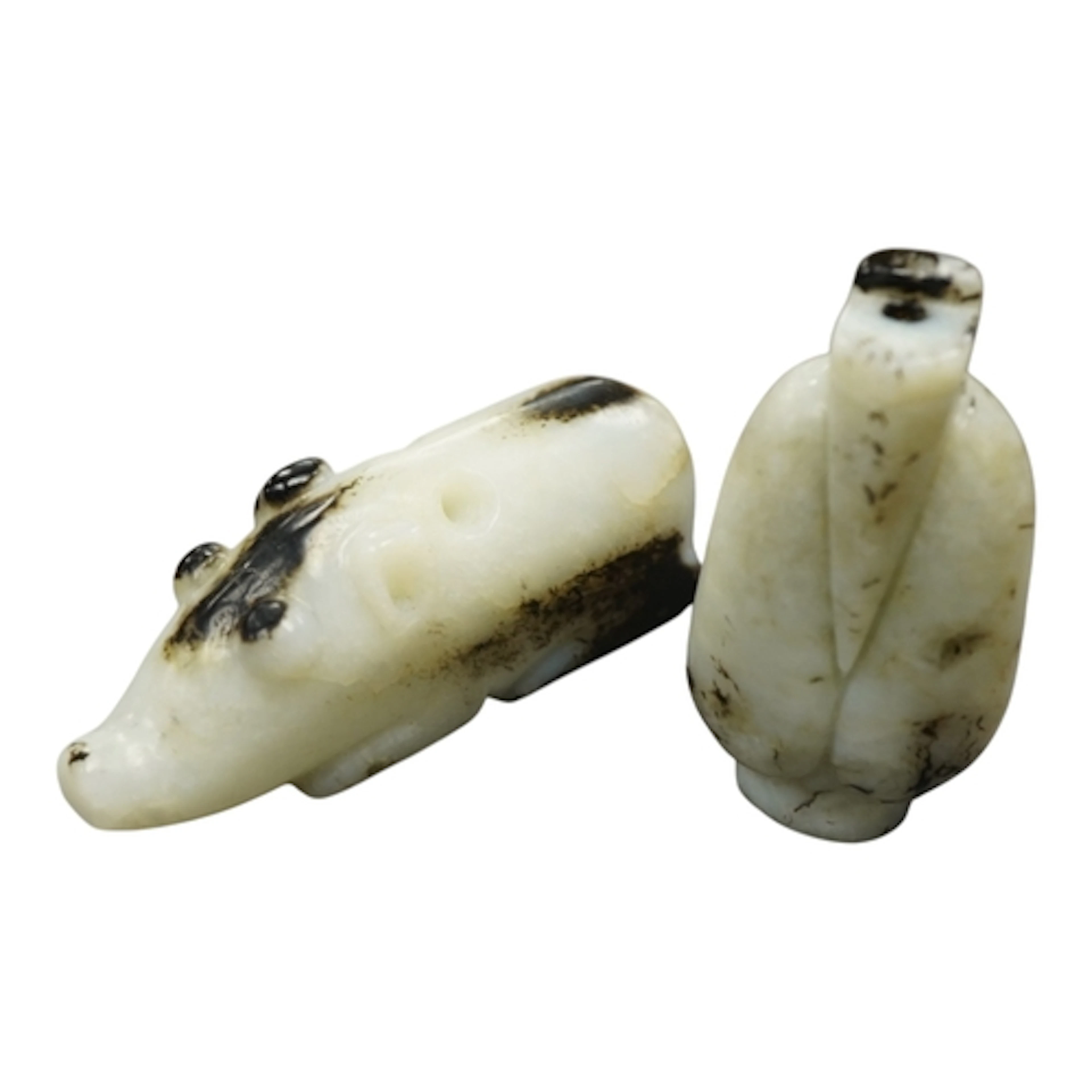 Two Chinese archaistic black and white jade carvings, larges...