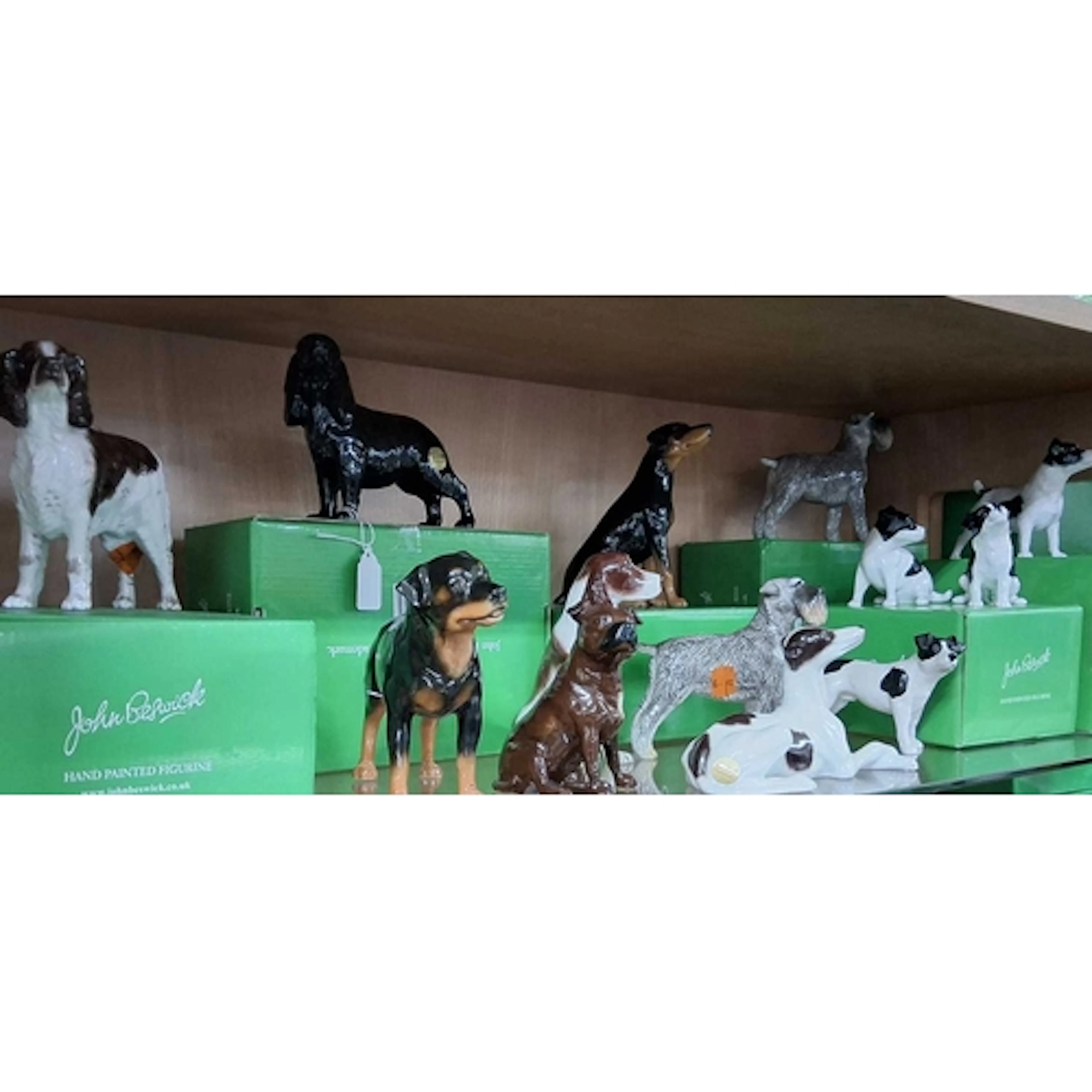 THIRTEEN JOHN BESWICK DOG SCULPTURES, comprising English Spr...