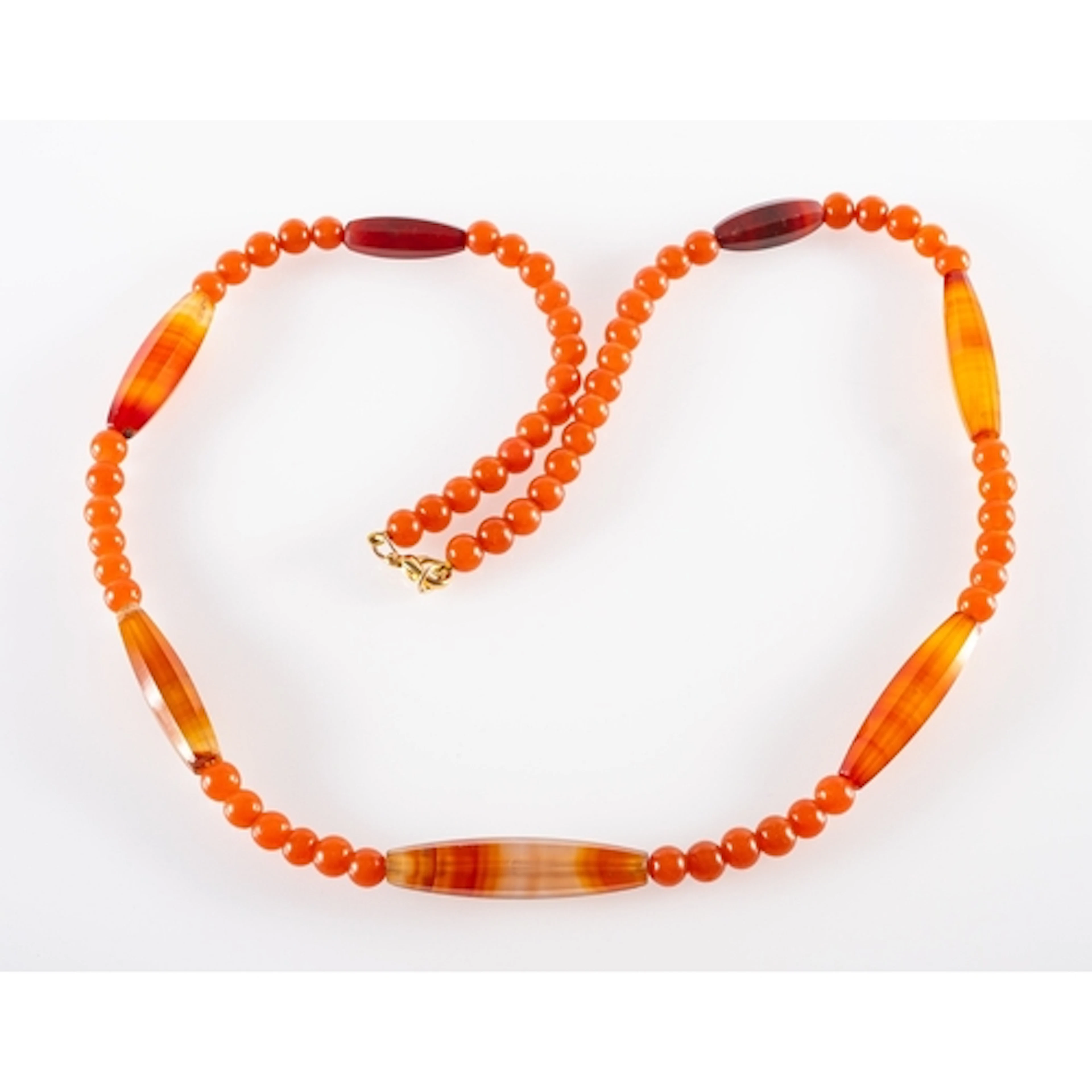 A carnelian agate and handmade glass bead necklace. The neck...