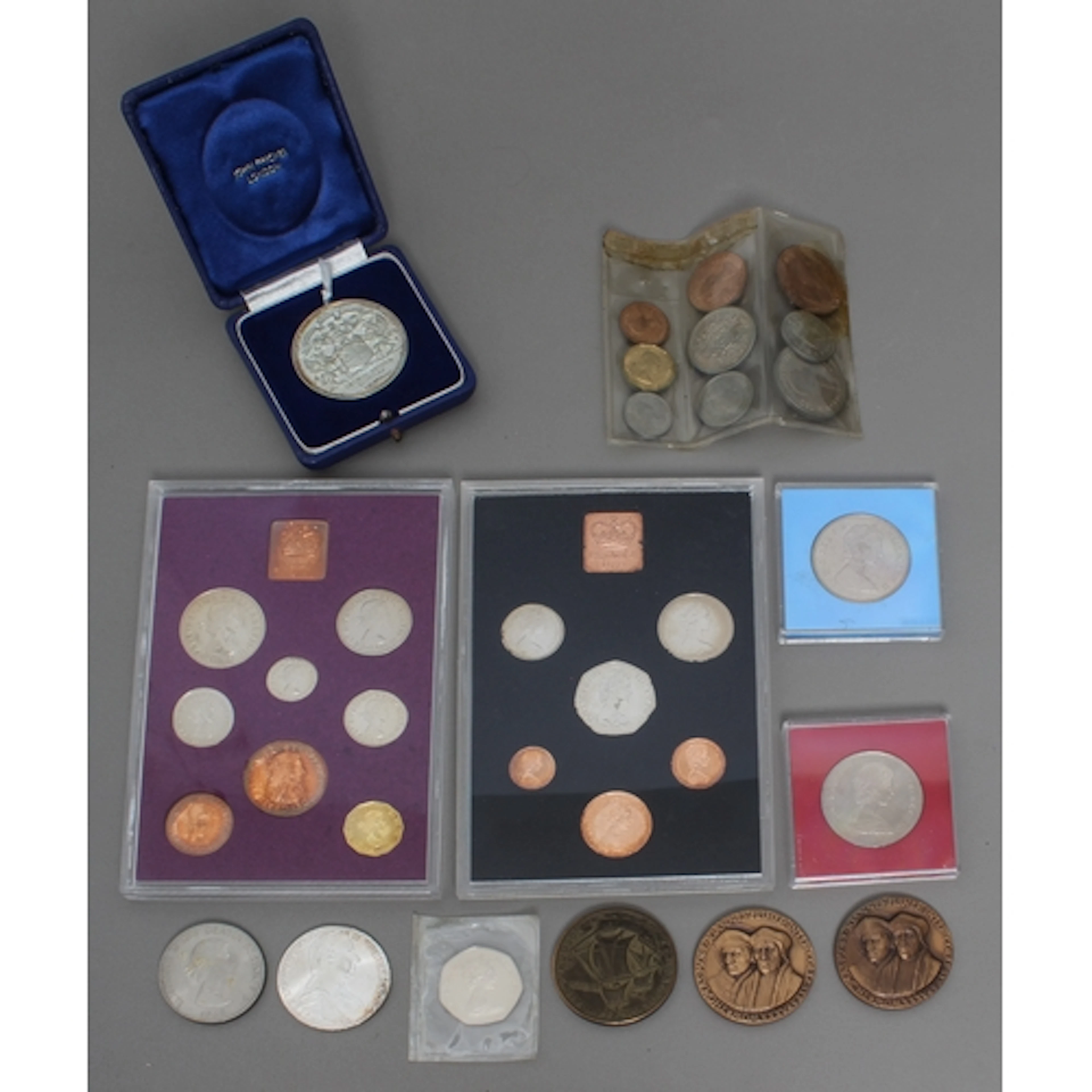 A small group of coins and medals comprising - 1. a silver S...