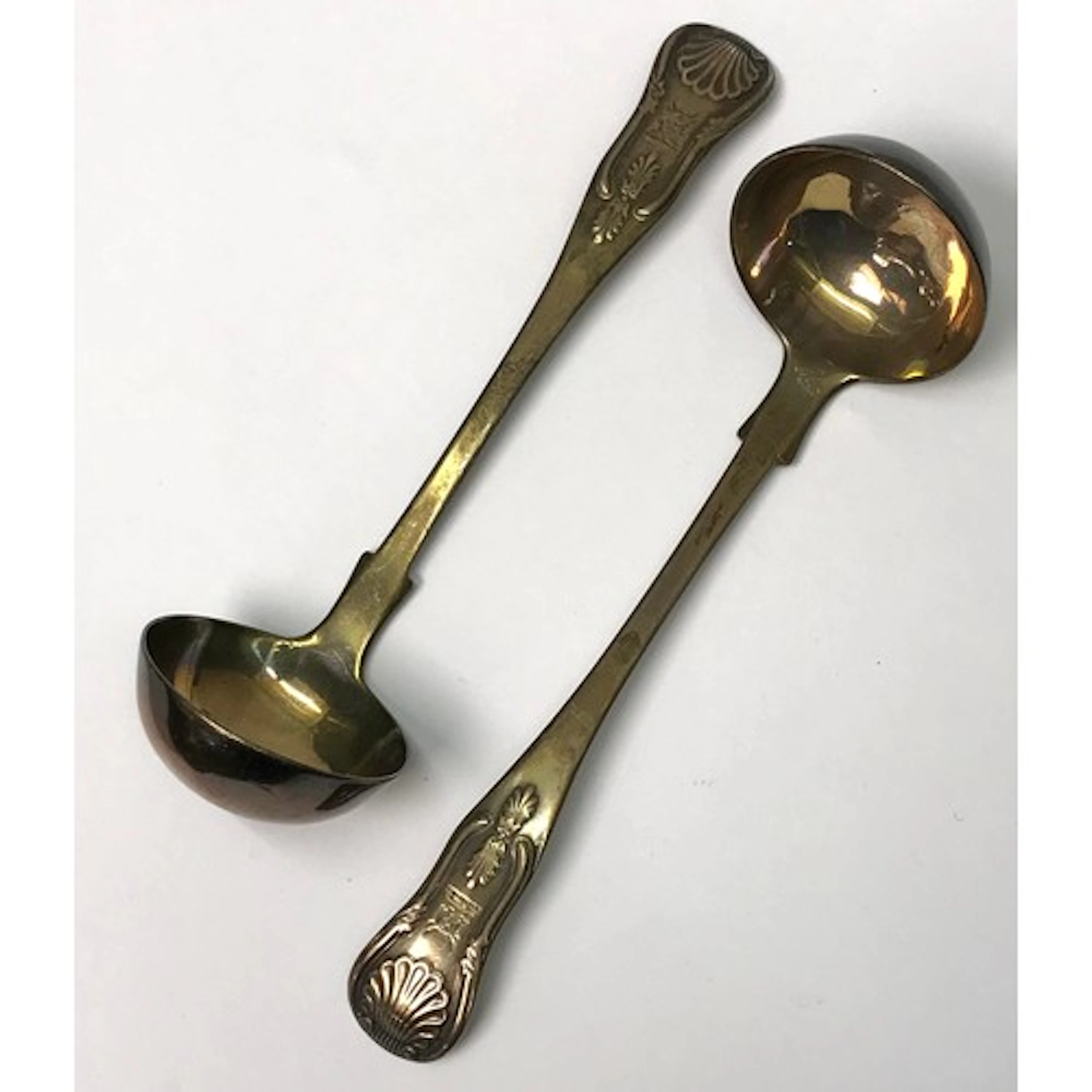 A pair of Scottish Victorian silver king's pattern toddy lad...