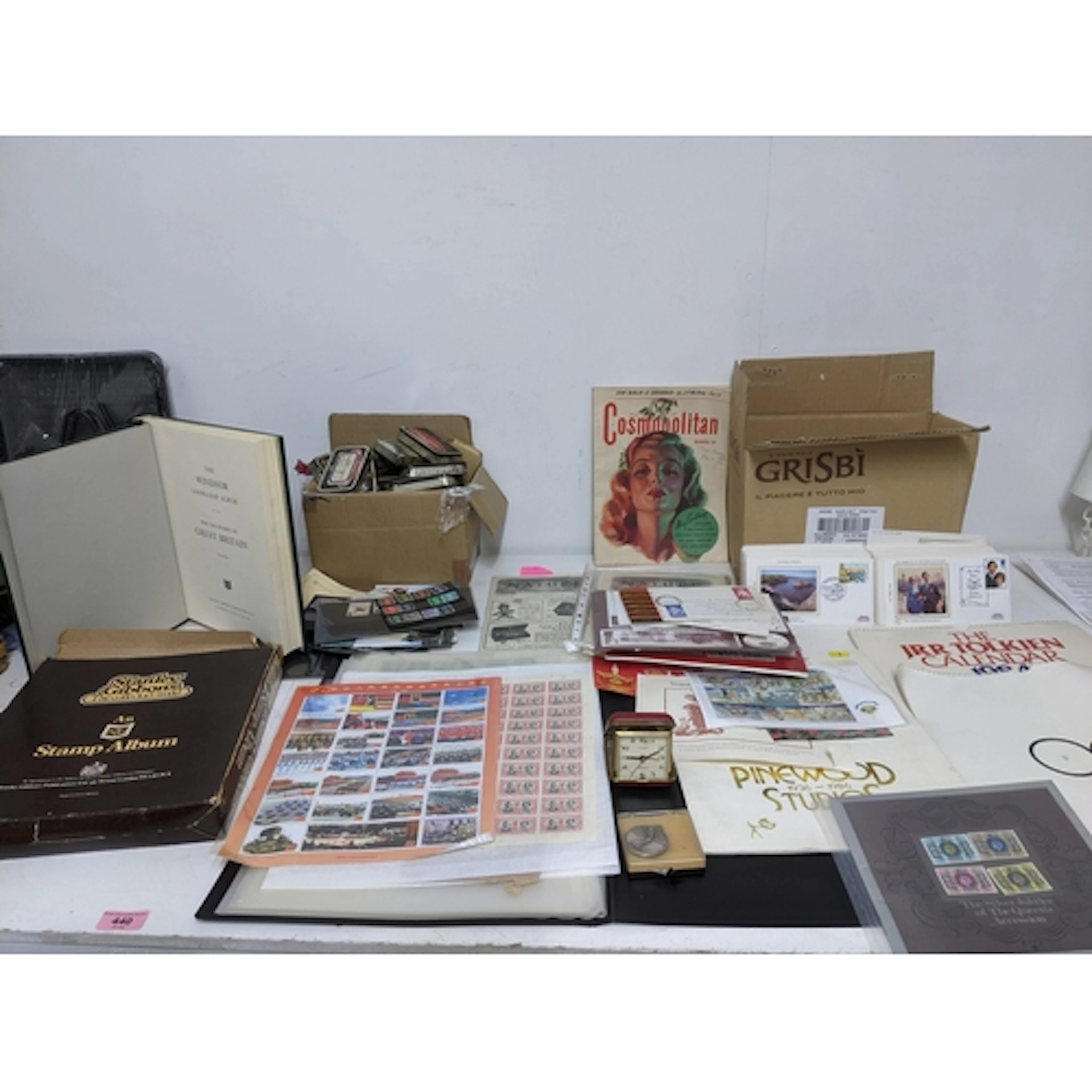 A selection of various collectables, mainly stamps, to inclu...