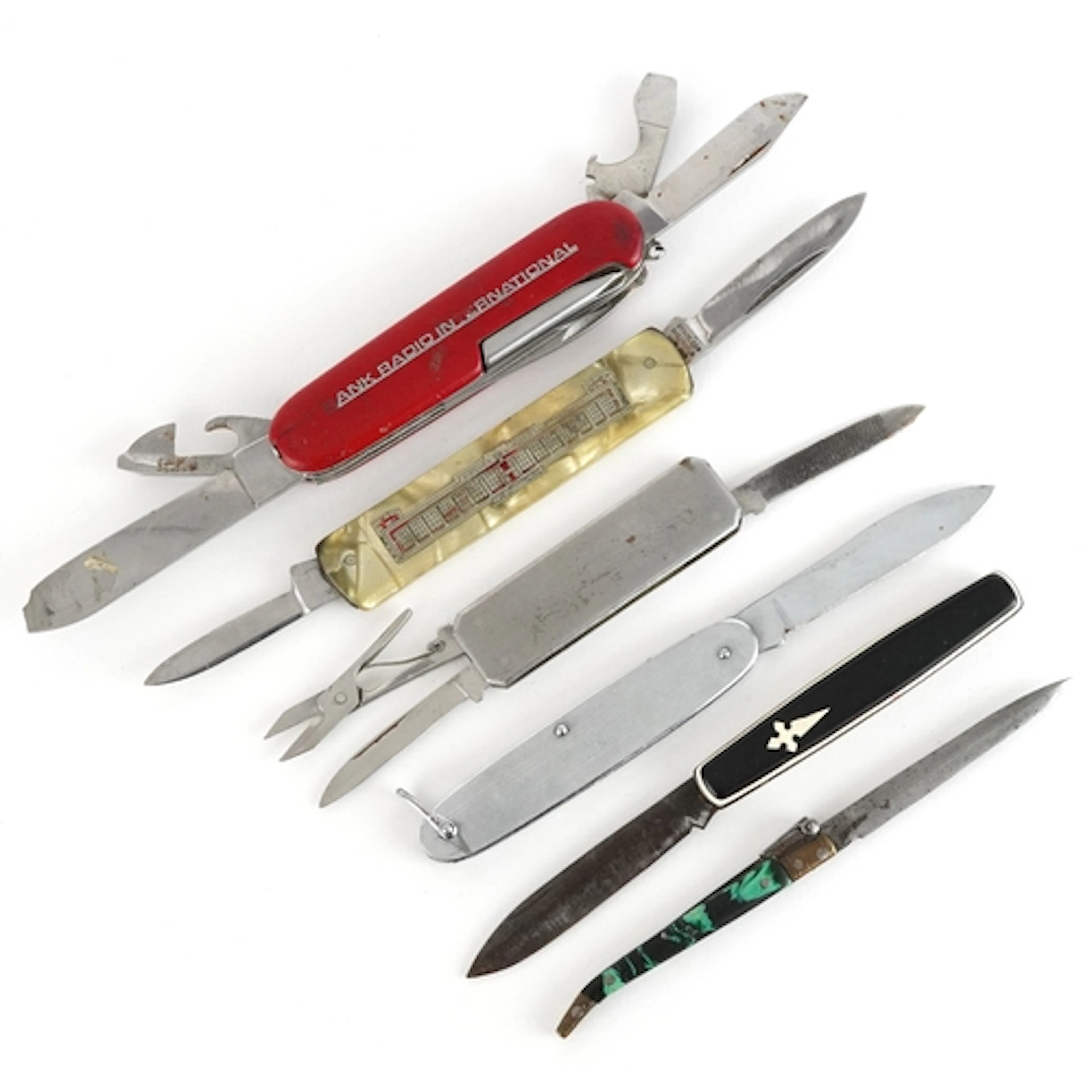 Six vintage folding pocket knives including Albacete with bl...