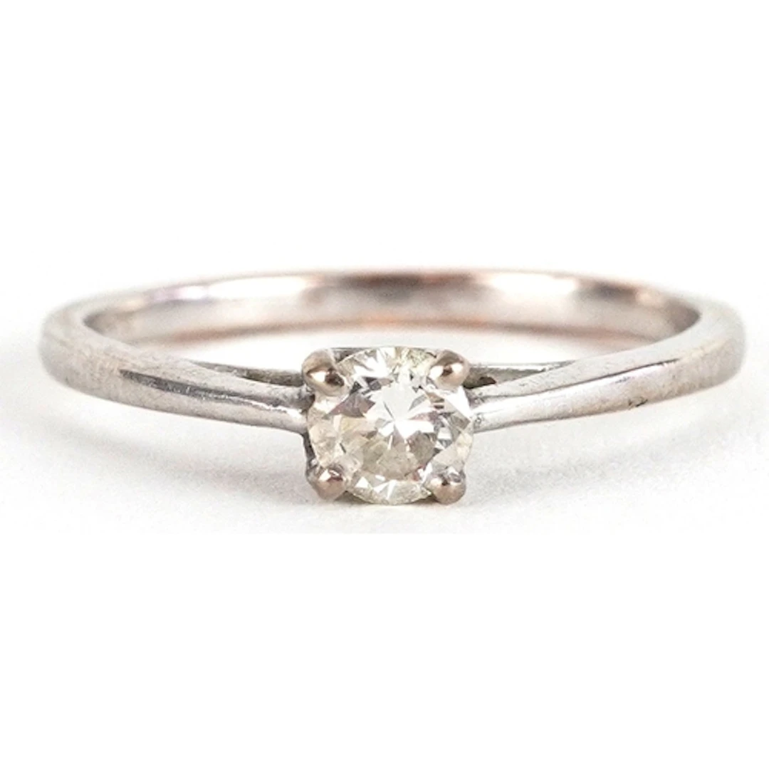 9ct white gold diamond solitaire ring, size J, 1.2g.