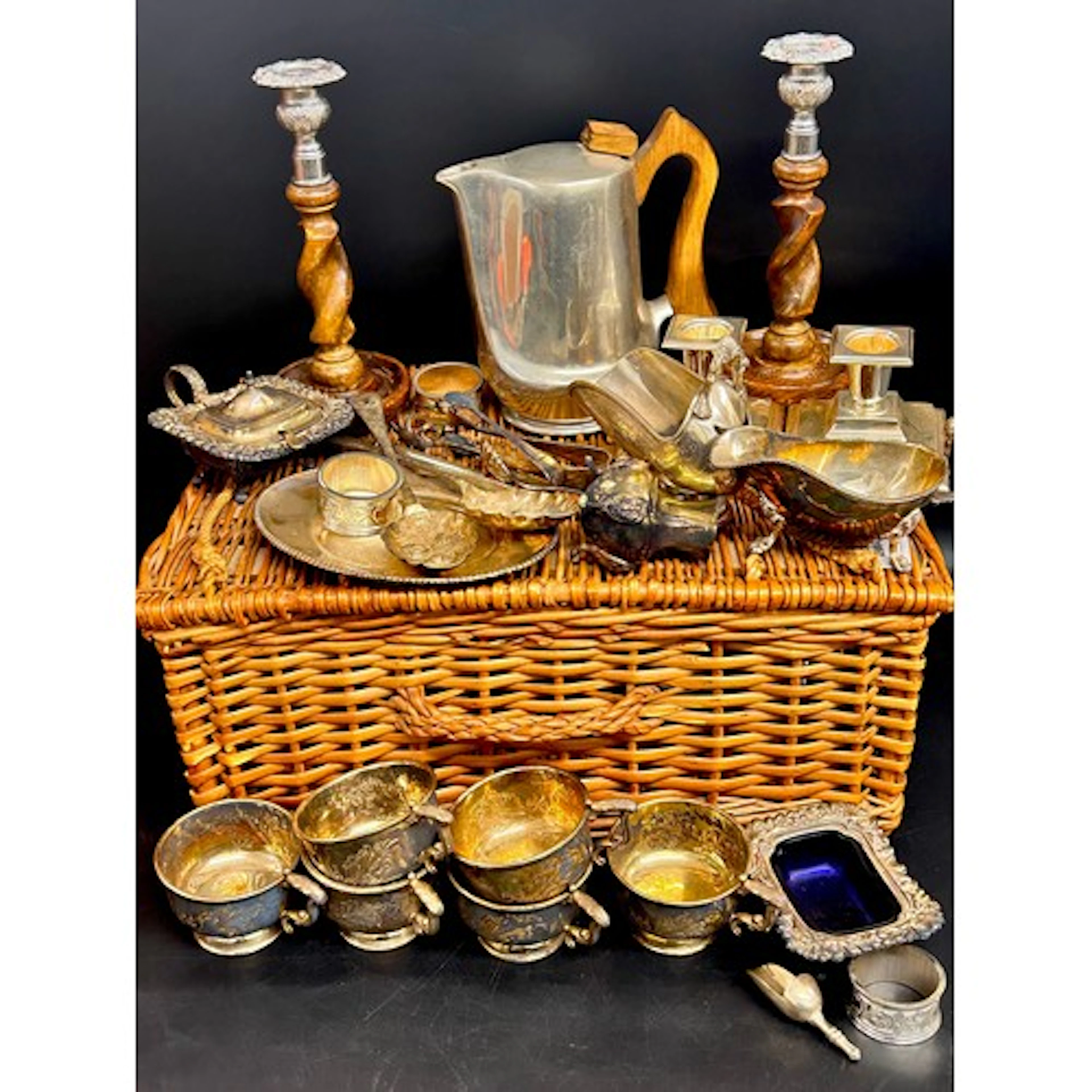 Collection of silver plate; cups, candlesticks, etc. *Not a...