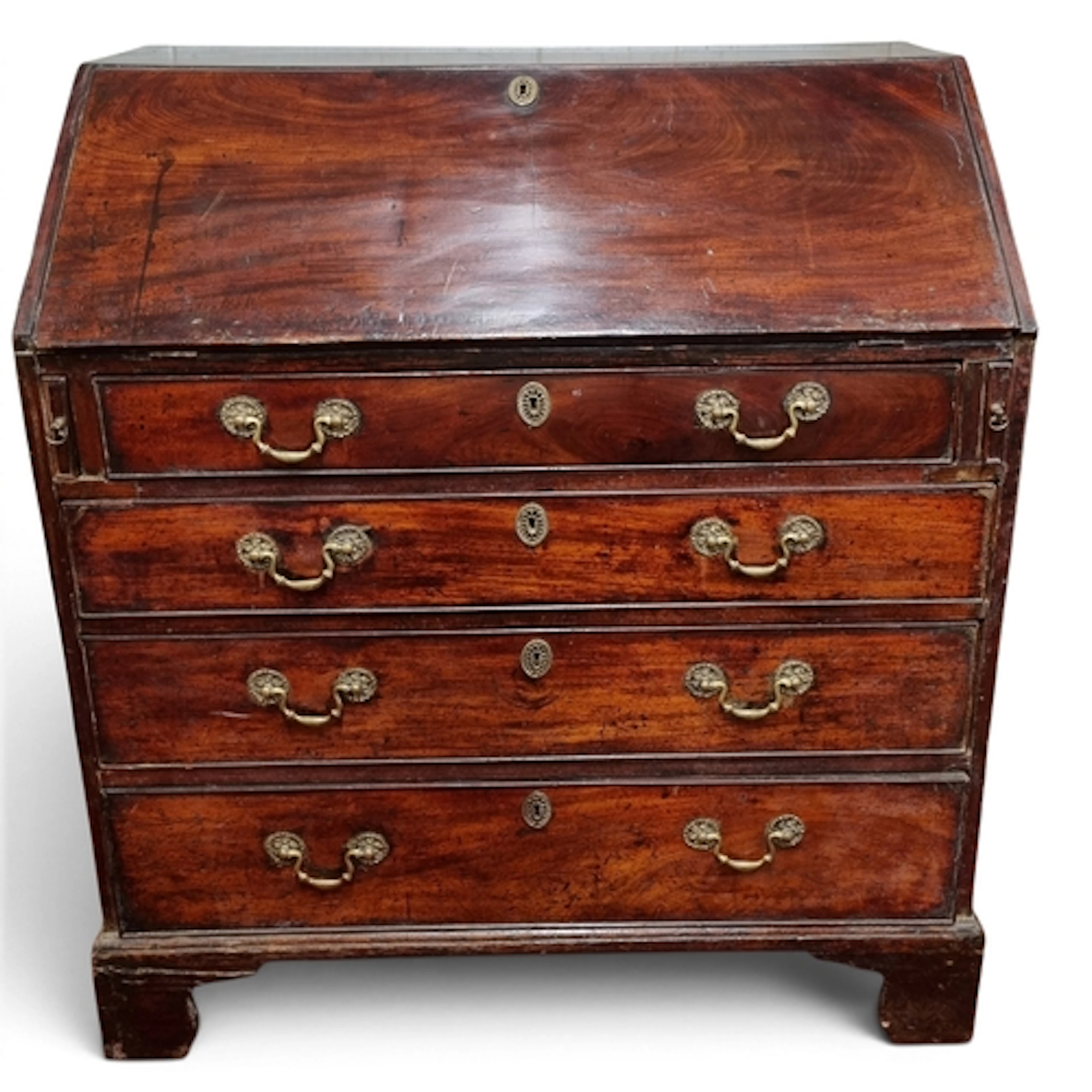 An early George 11 Mahogany Bureau of neat proportions with ...
