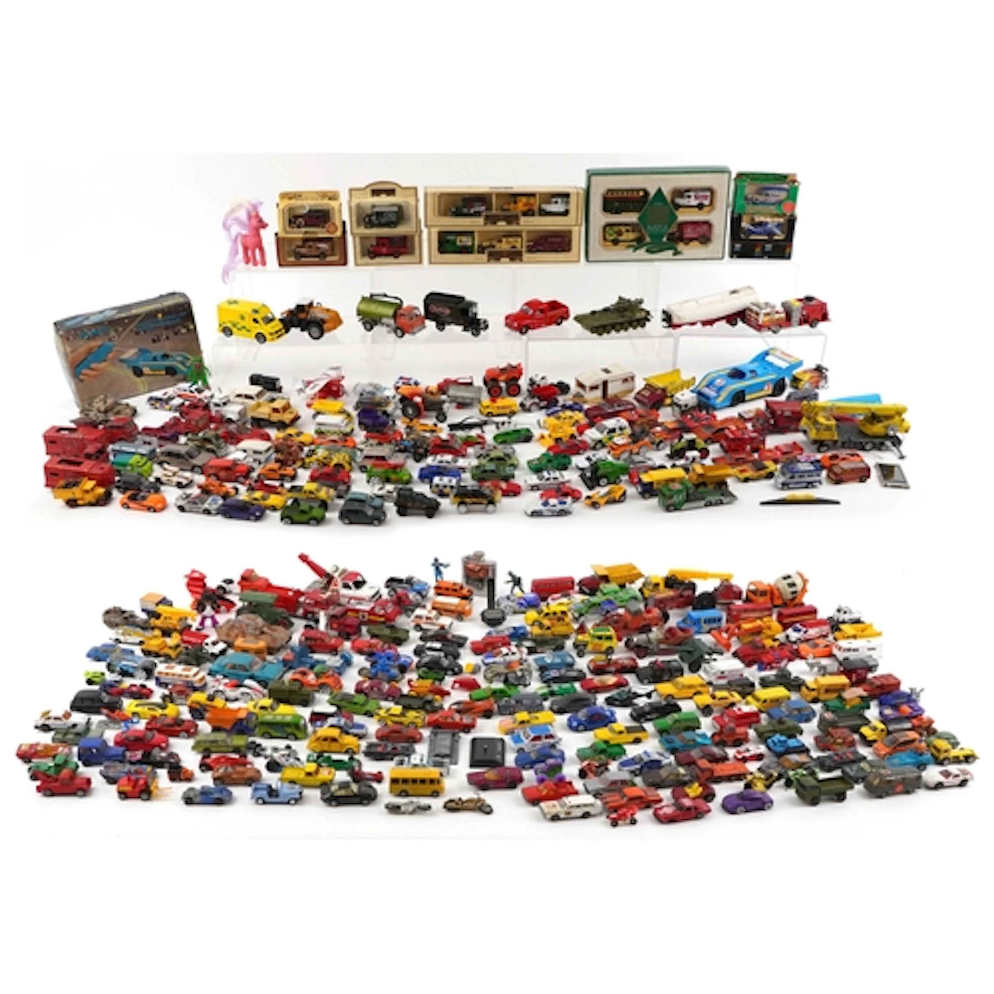 Large collection of vintage toy vehicles, mostly diecast, in...