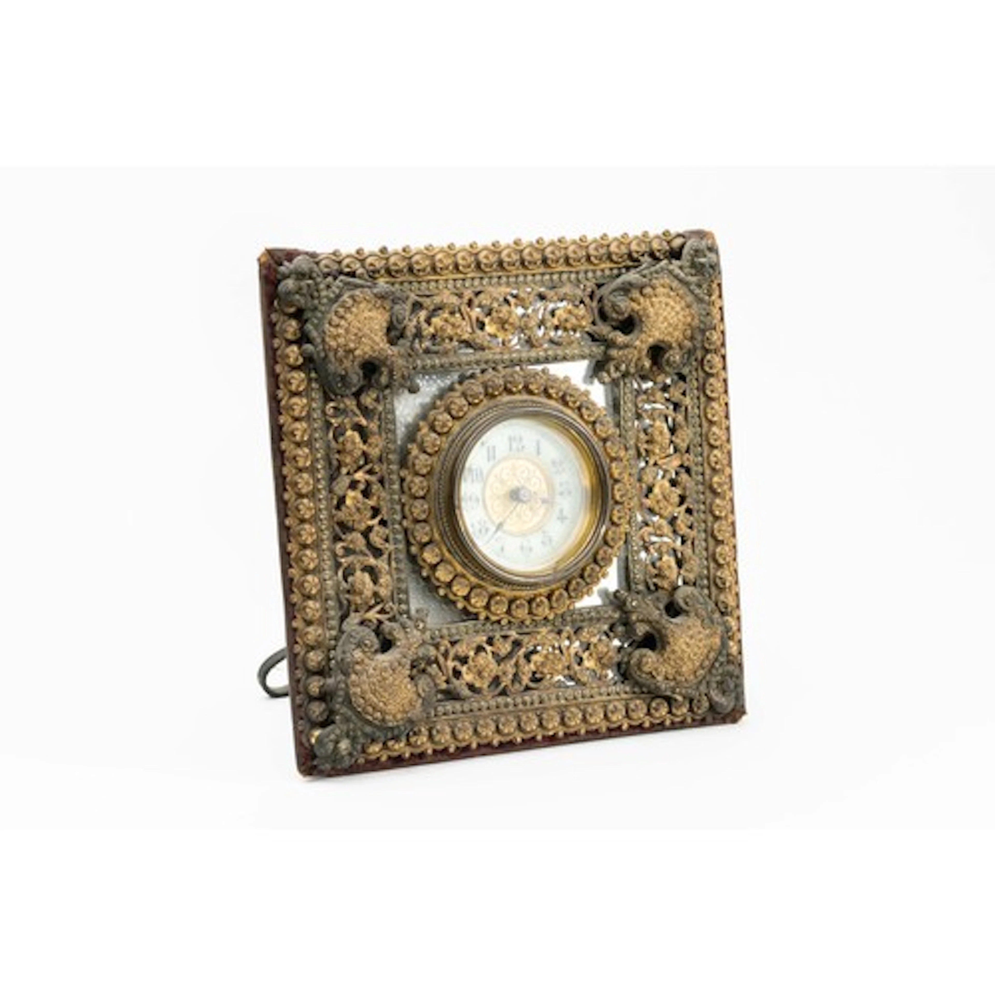 A "British United Clock Co" dressing table clock, easel desi...