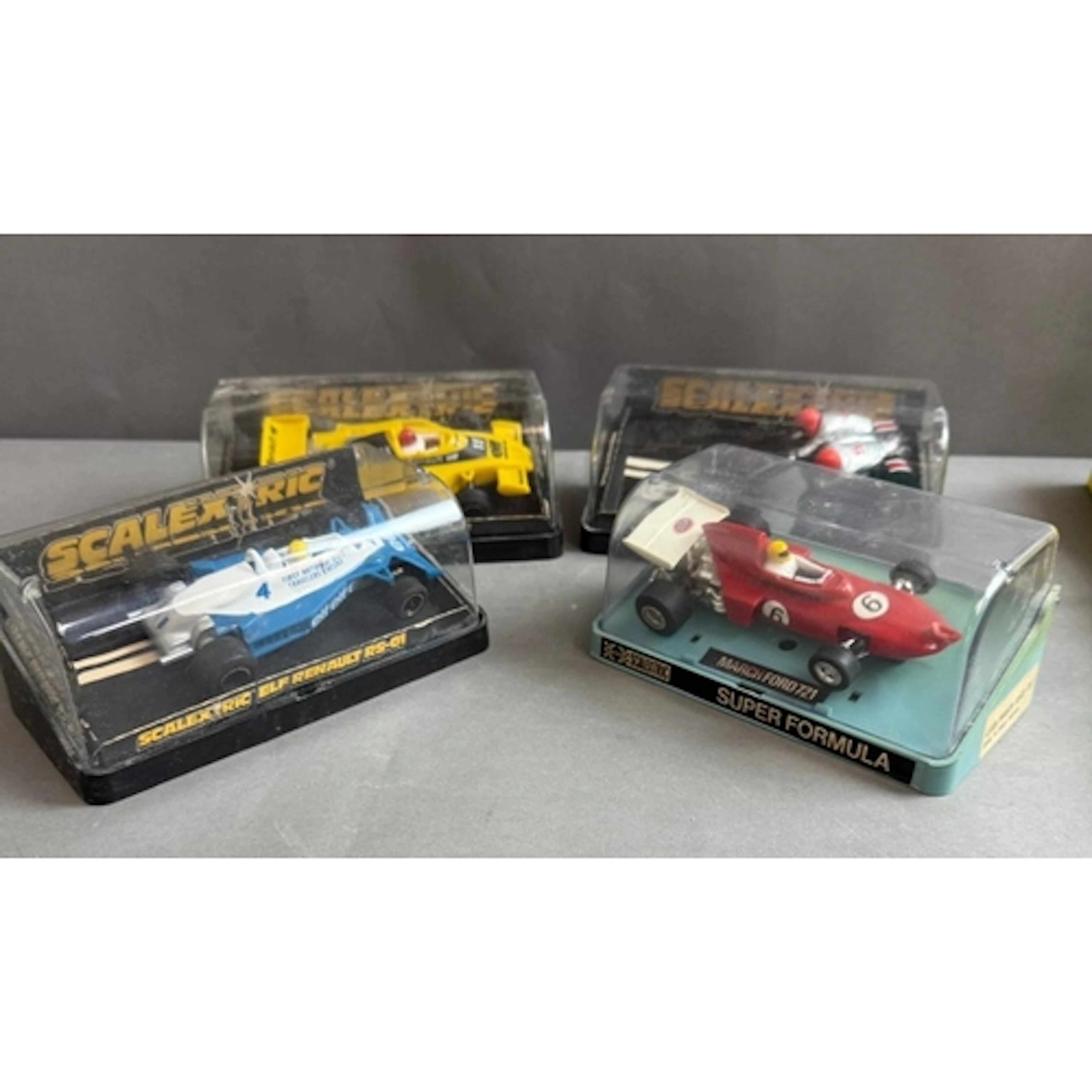 Four boxed vintage Scalectrix cars