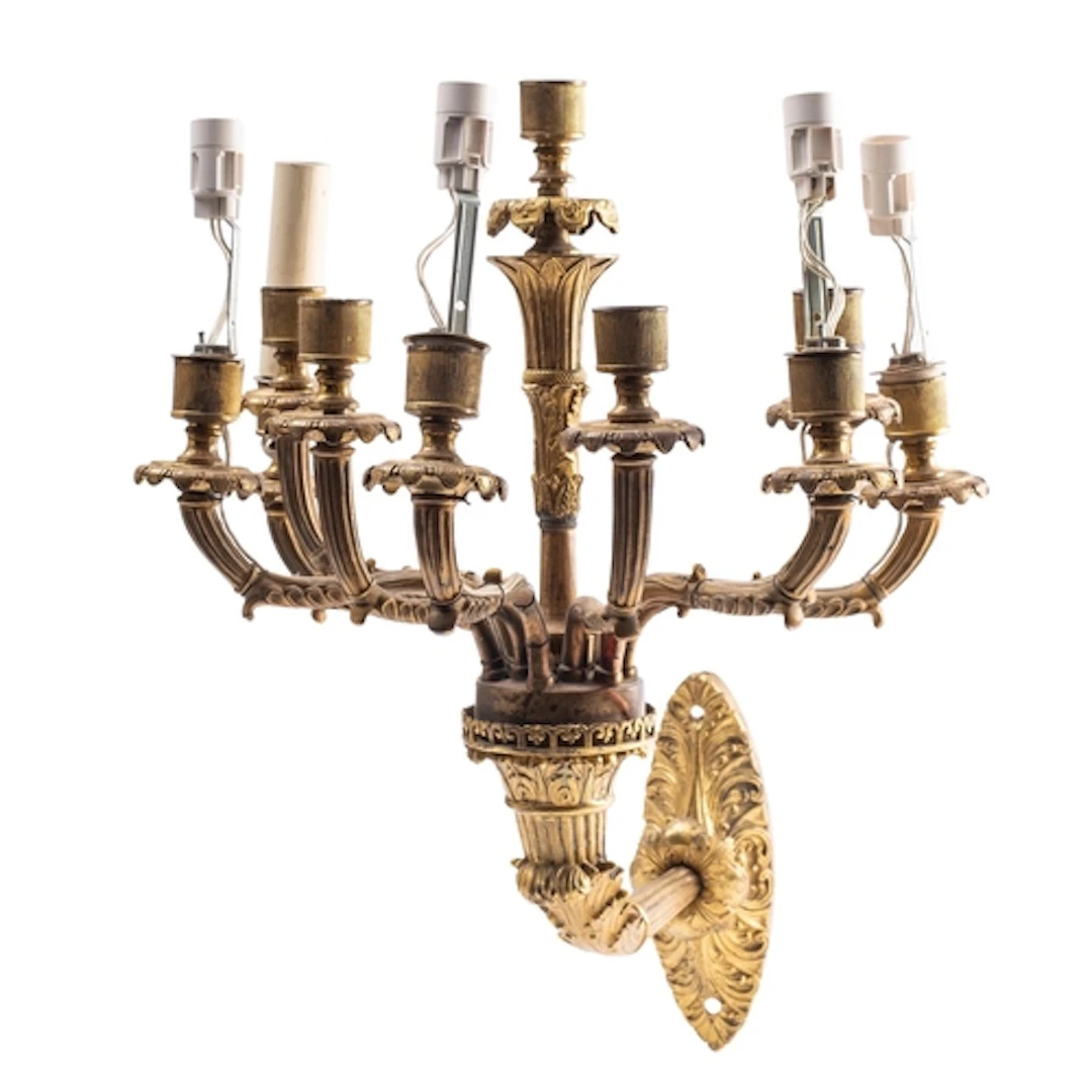 A pair of gilt metal ten-light wall appliques, in Restaurati...