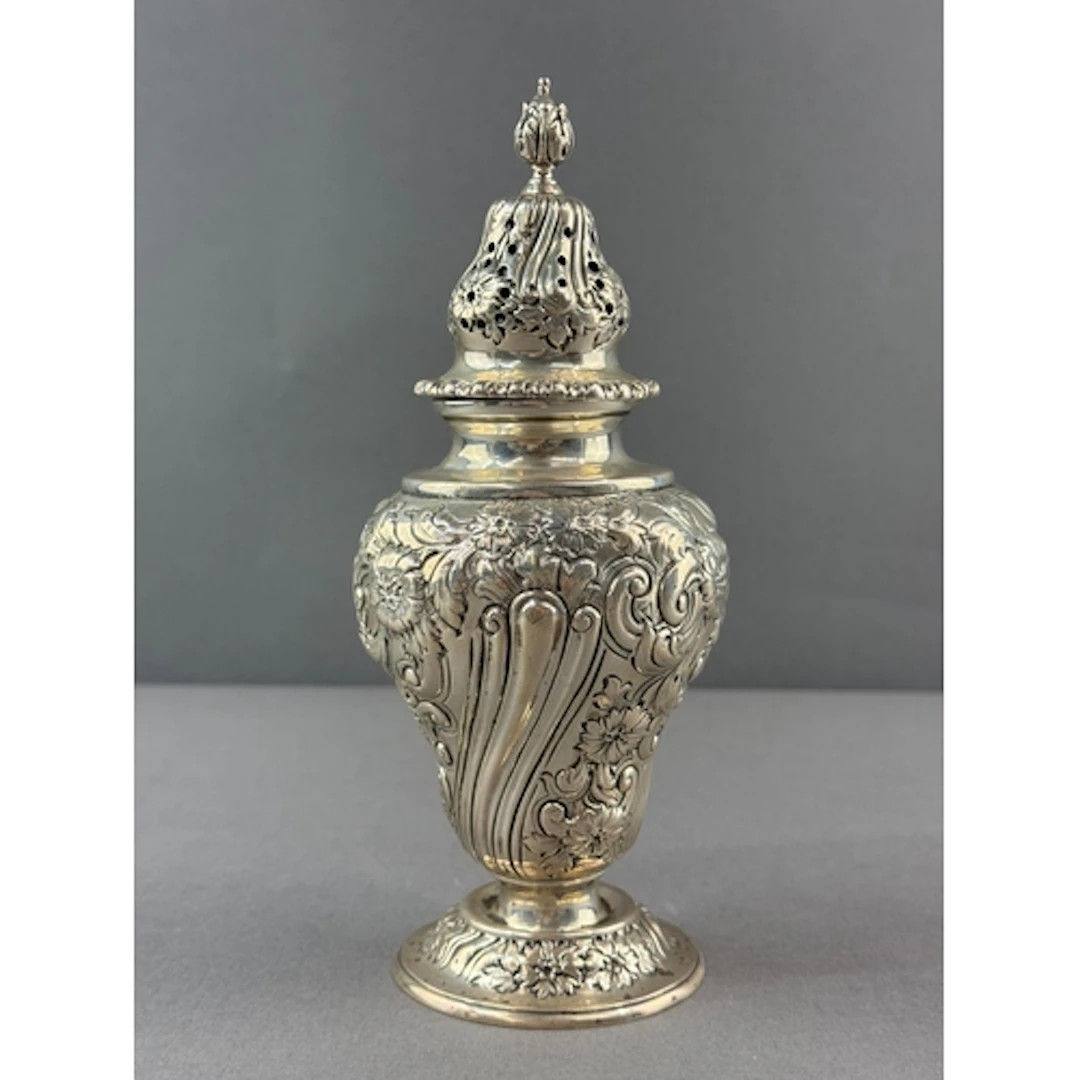 Silver: a caster of baluster form by The Goldsmiths & Si...