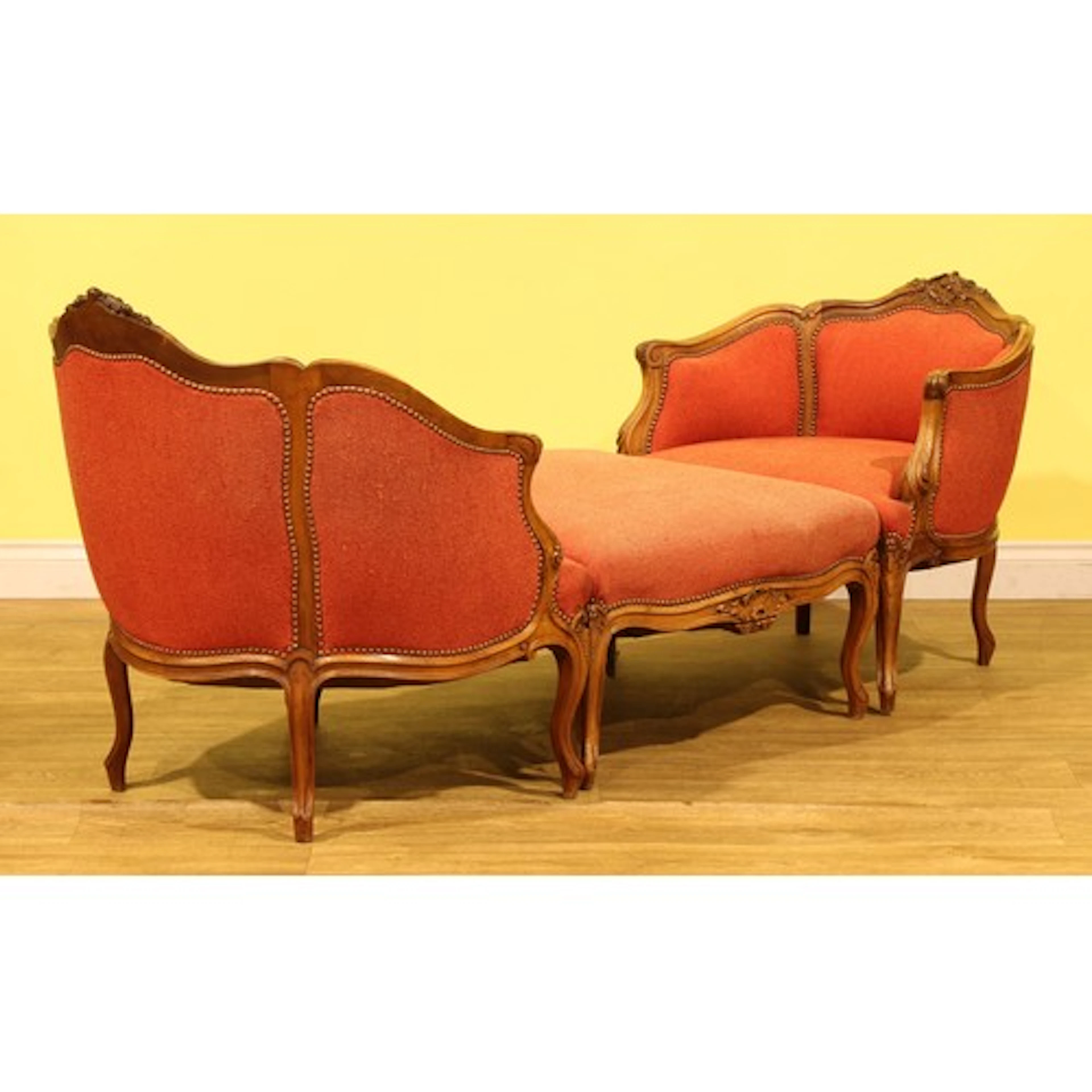 A Louis XV Revival walnut duchesse brisée, comprising a pair...