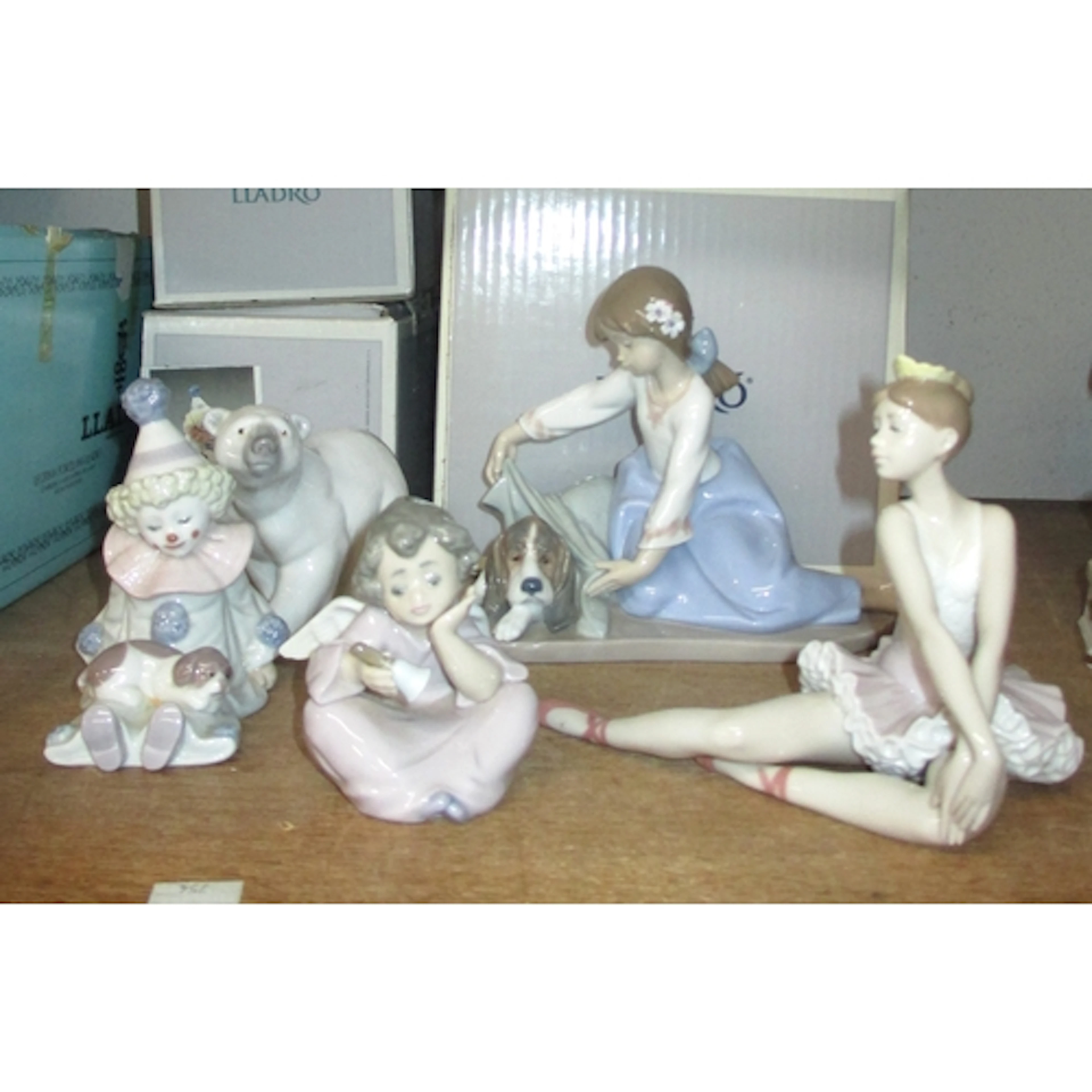 Five various Lladro figures, 06174, 05688, 5723, 1207, and 5...