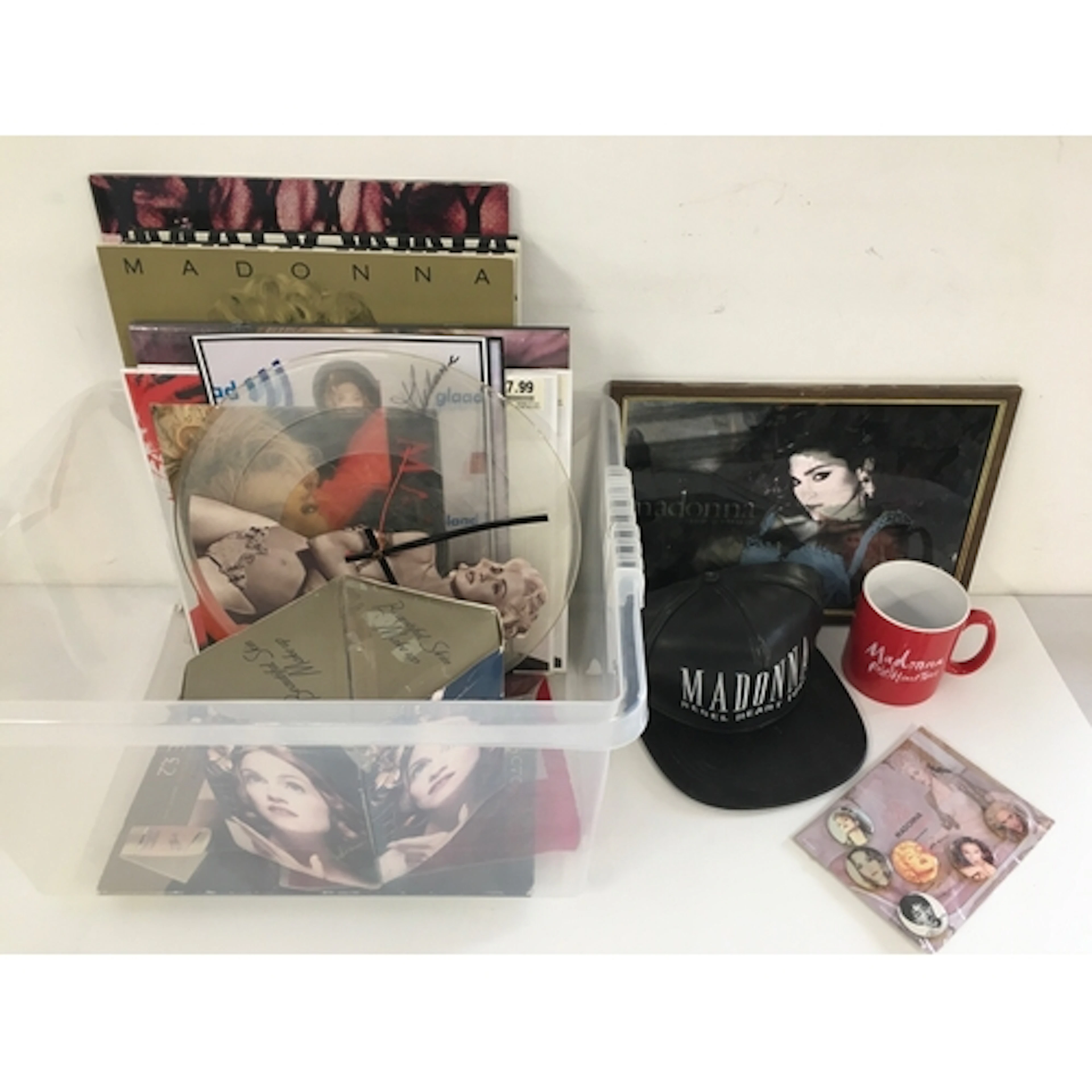 Two boxes of Madonna memorabilia comprising baseball cap, ba...