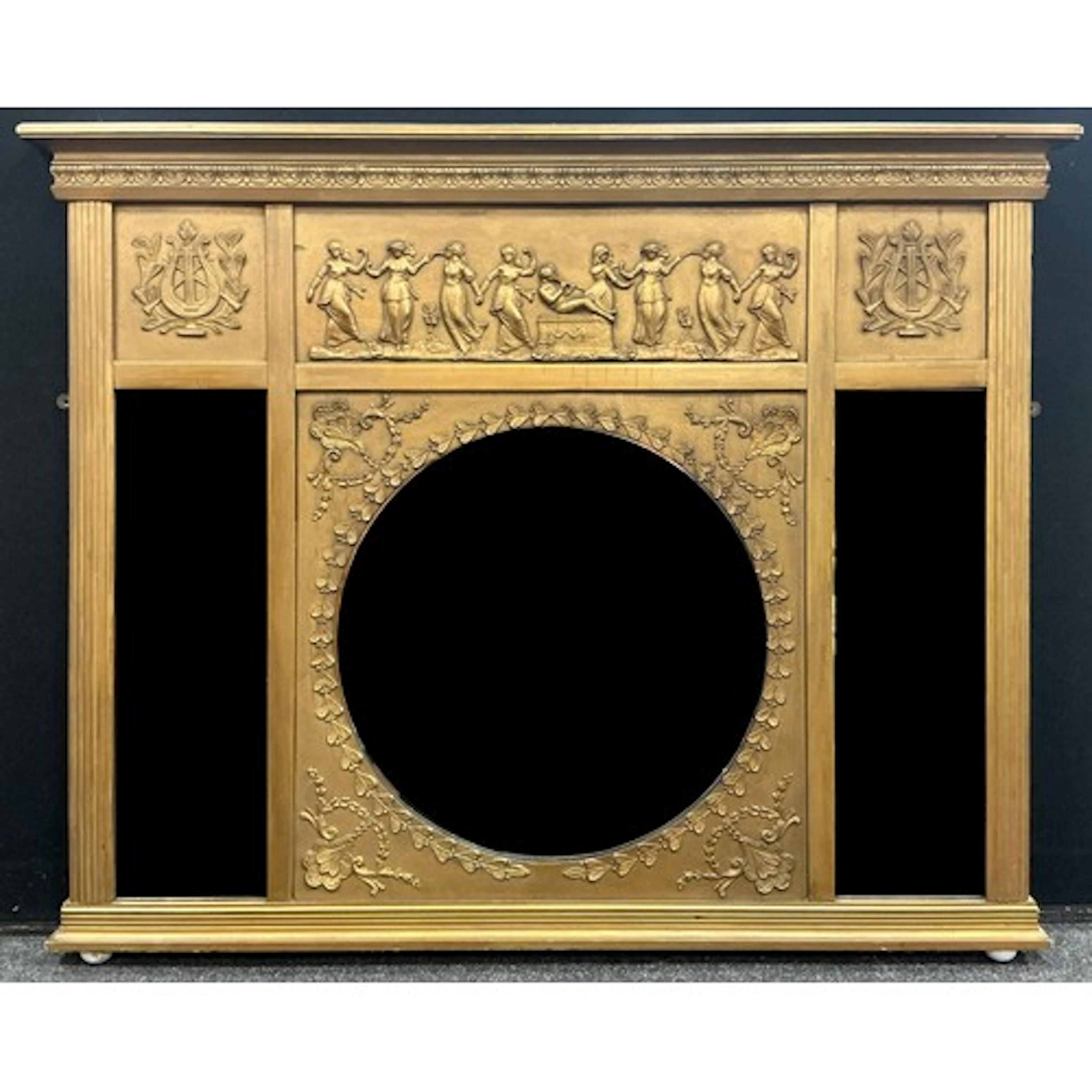 A Regency style large gilt over mantle mirror, the moulded t...