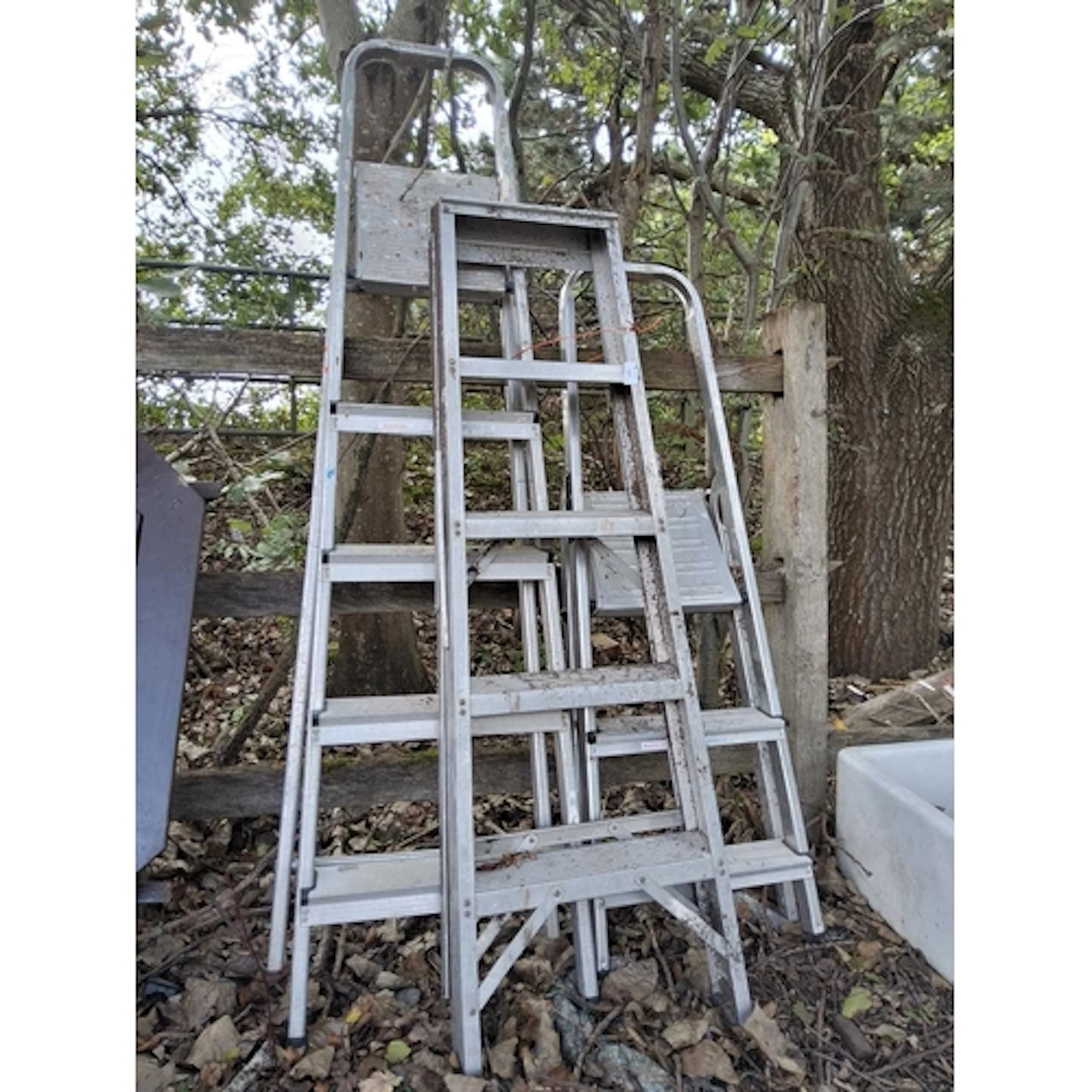 THREE ALUMINIUM STEP LADDERS Paint splatter...