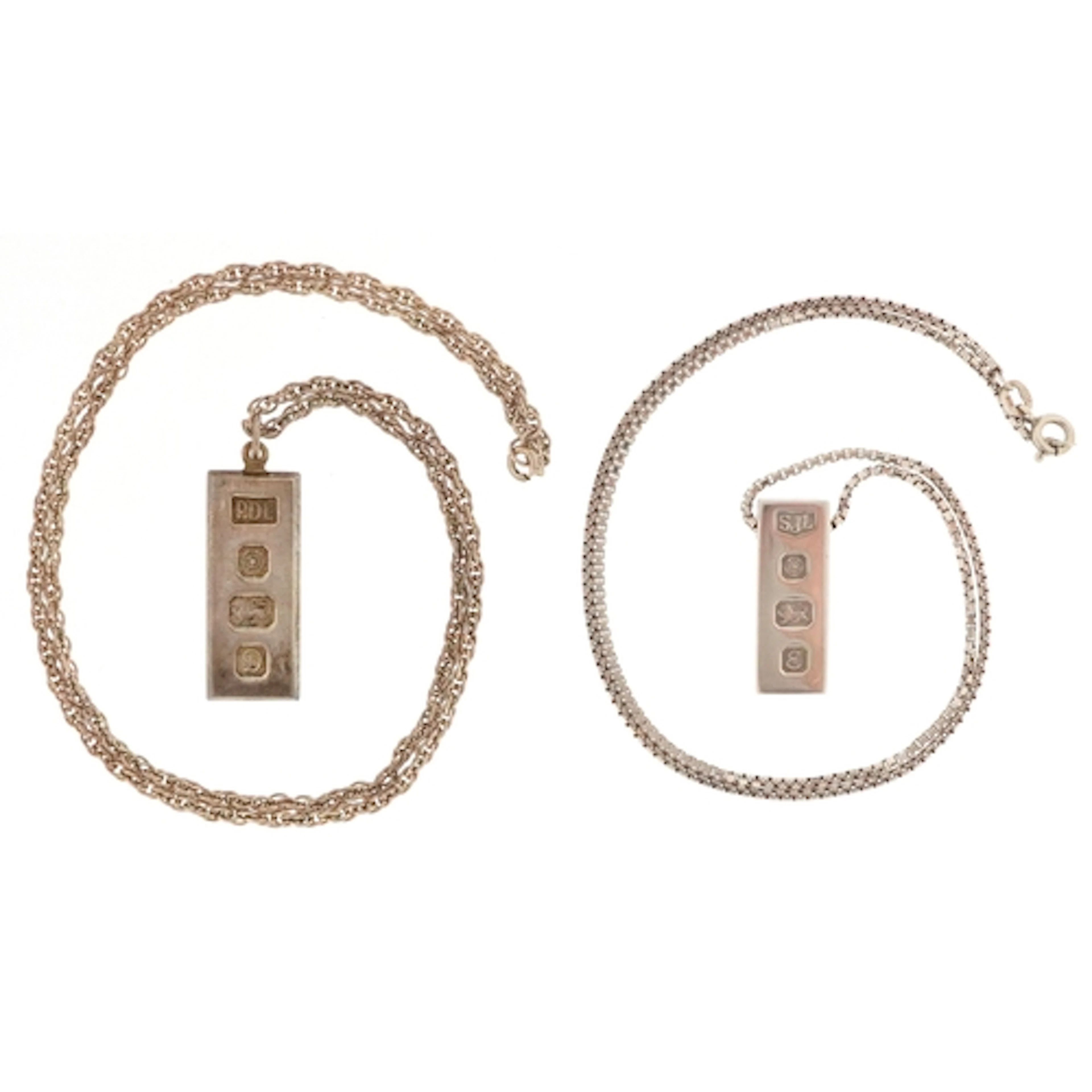 Two Elizabeth II silver ingot pendants comprising Sheffield ...