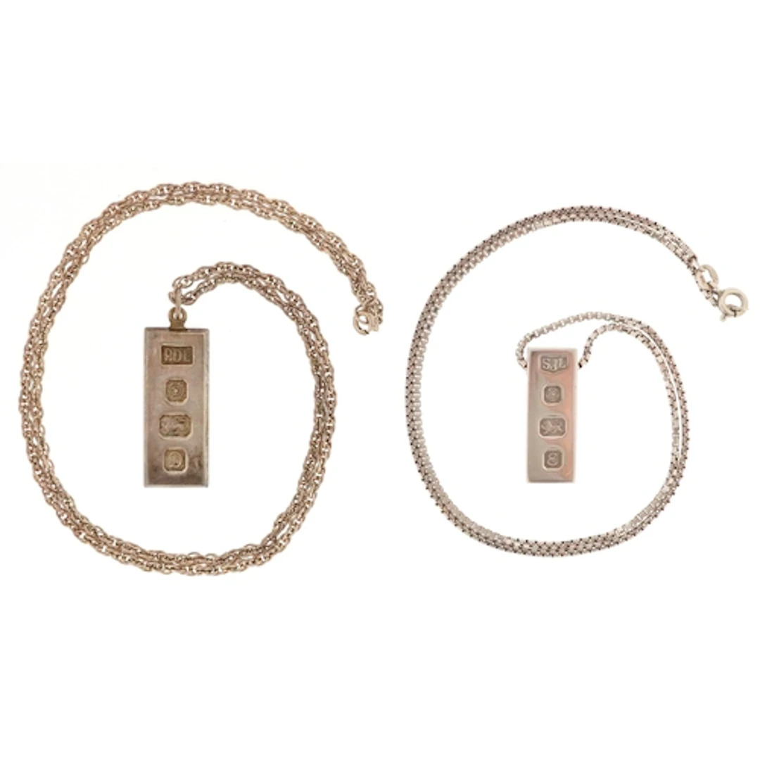 Two Elizabeth II silver ingot pendants comprising Sheffield ...