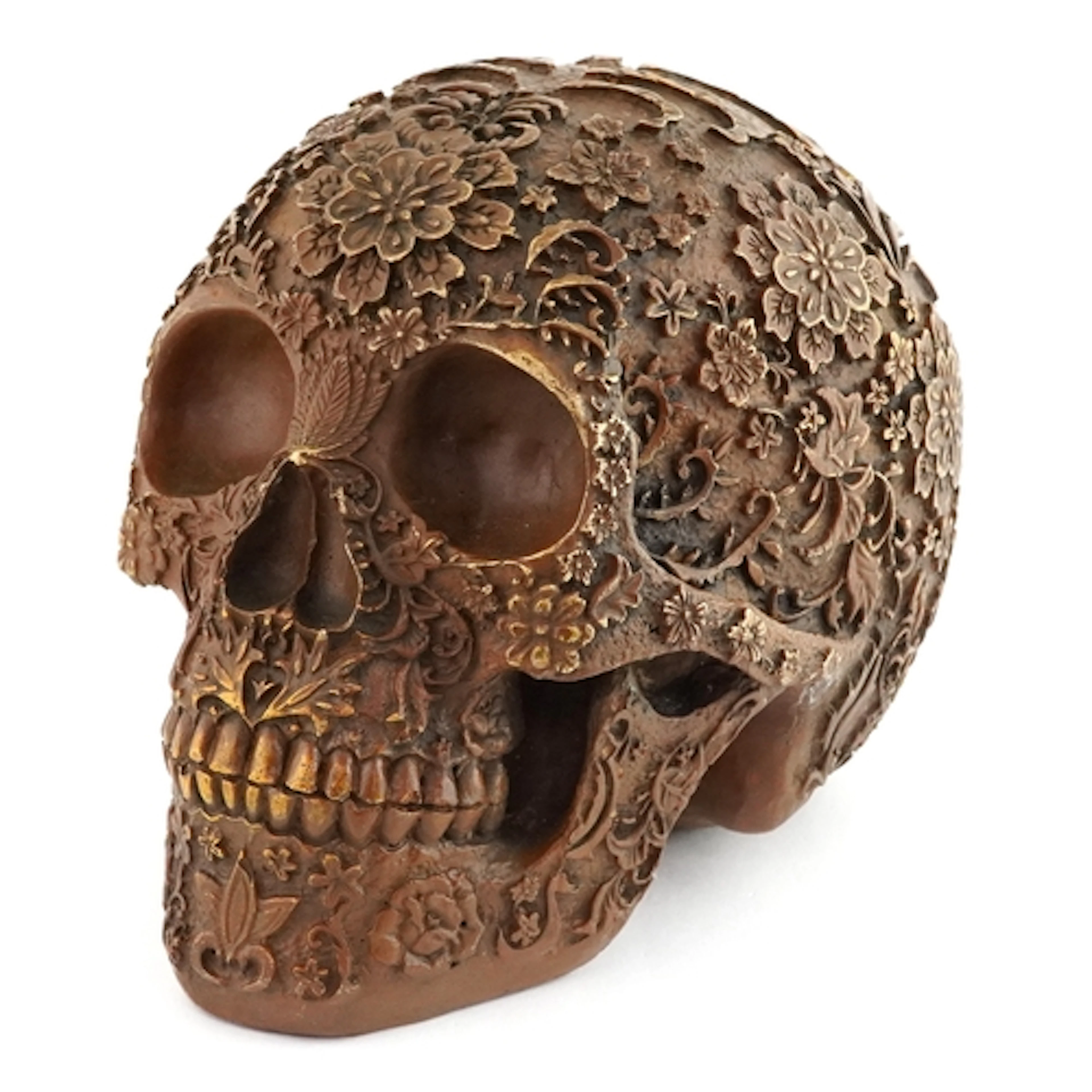Bronzed study of a Mexican style human skull, 19cm high.