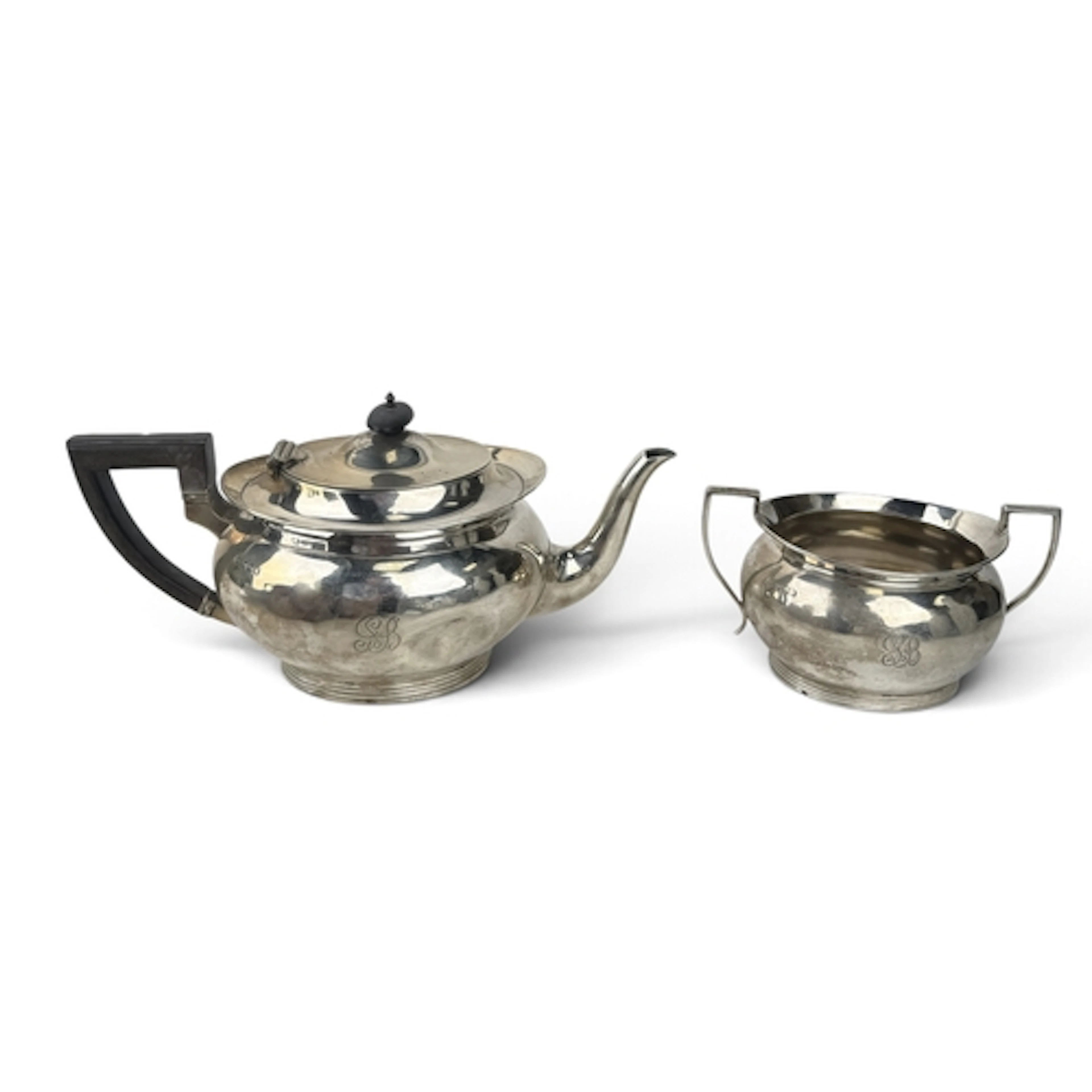 A SILVER TEAPOT AND SUGAR BASIN BY MAPPIN AND WEBB Total wei...