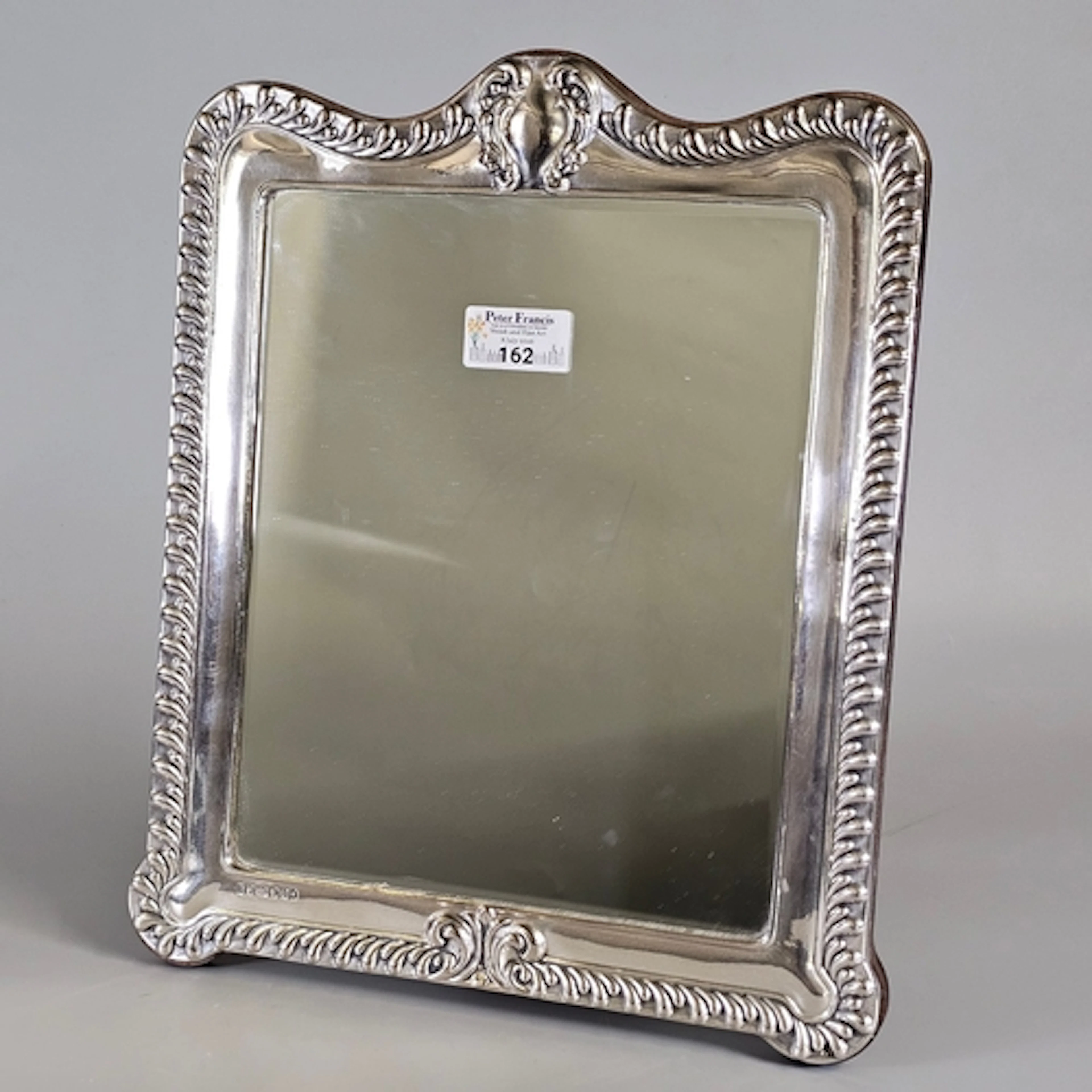 Queen Elizabeth II silver framed easel table mirror, with or...
