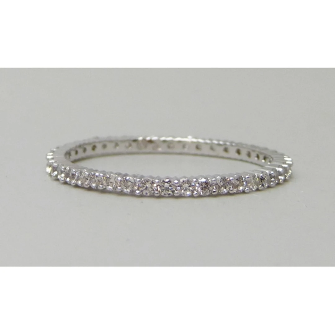 A Swarovski ring, R