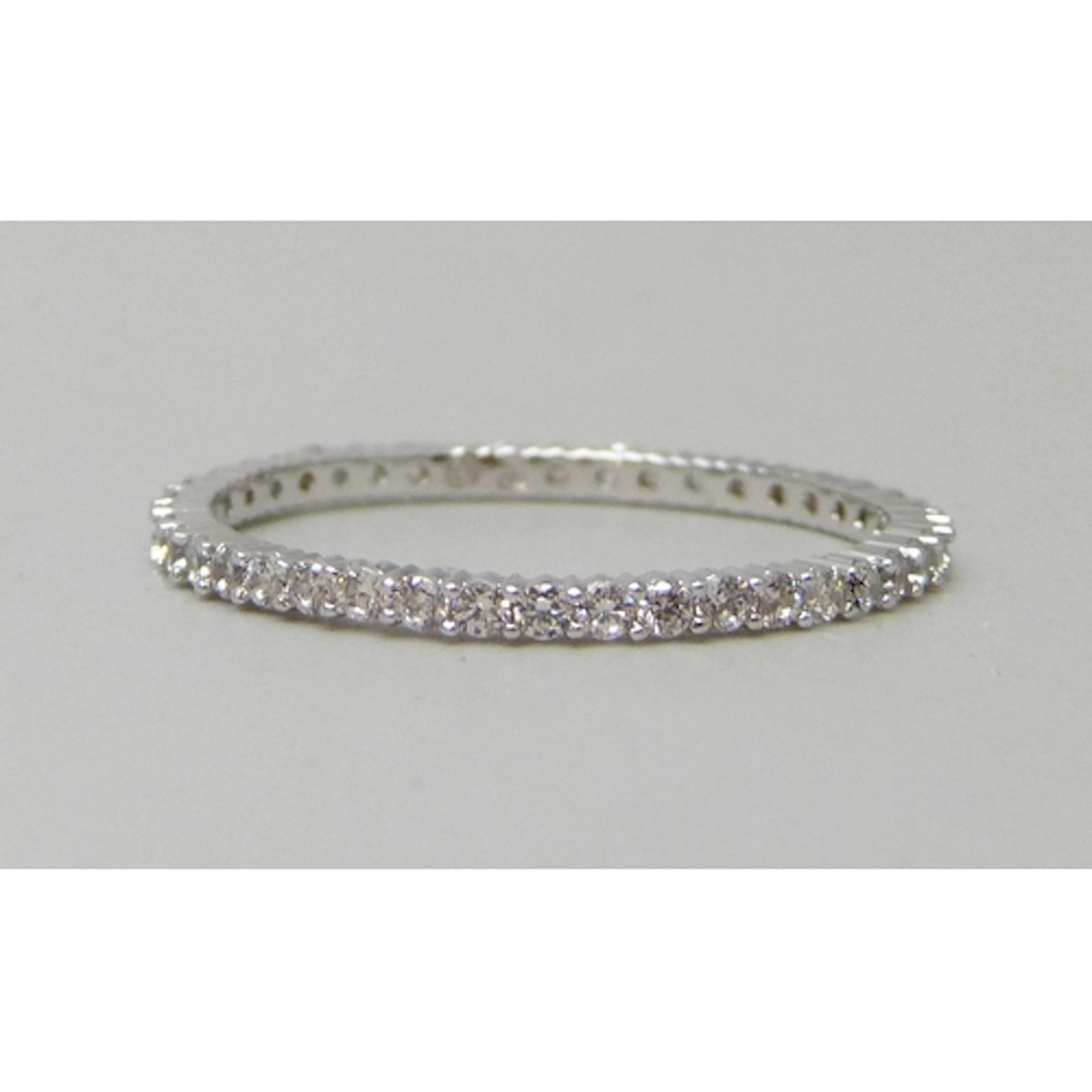 A Swarovski ring, R