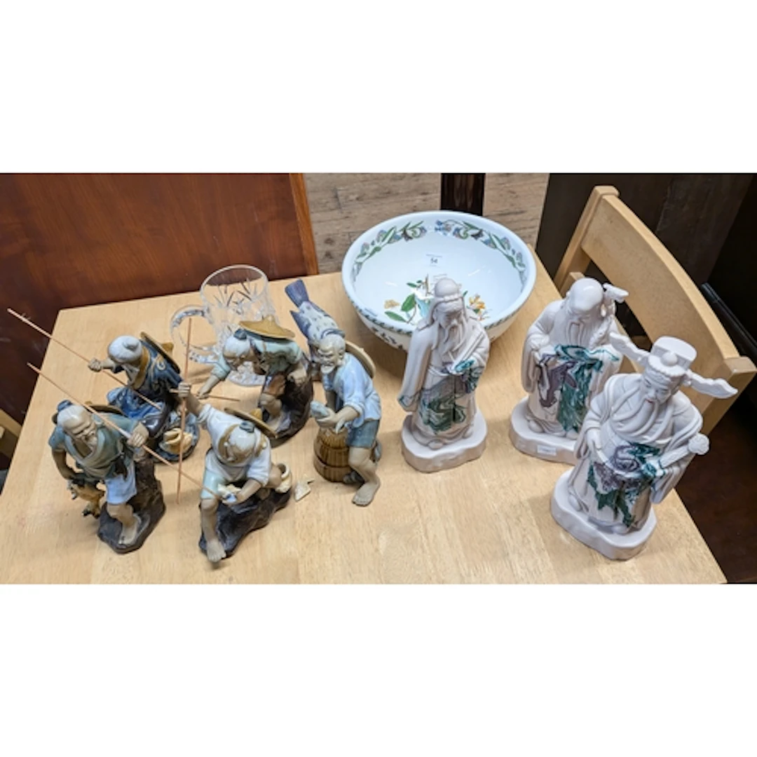 Eight various Japanese figure ornaments together with a glas...