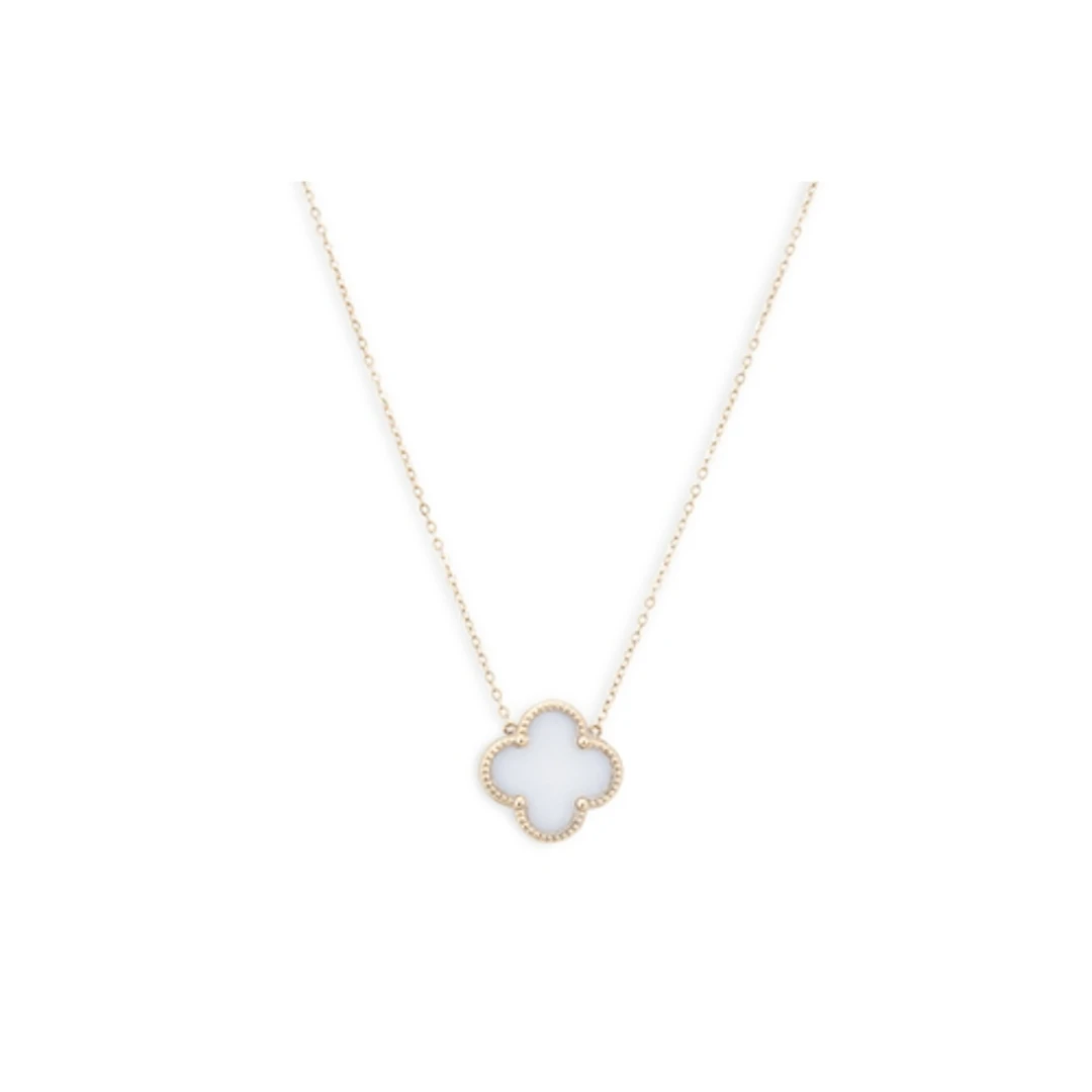 A STONE SET PENDANT, of quatrefoil motif, mounted in 14ct ye...