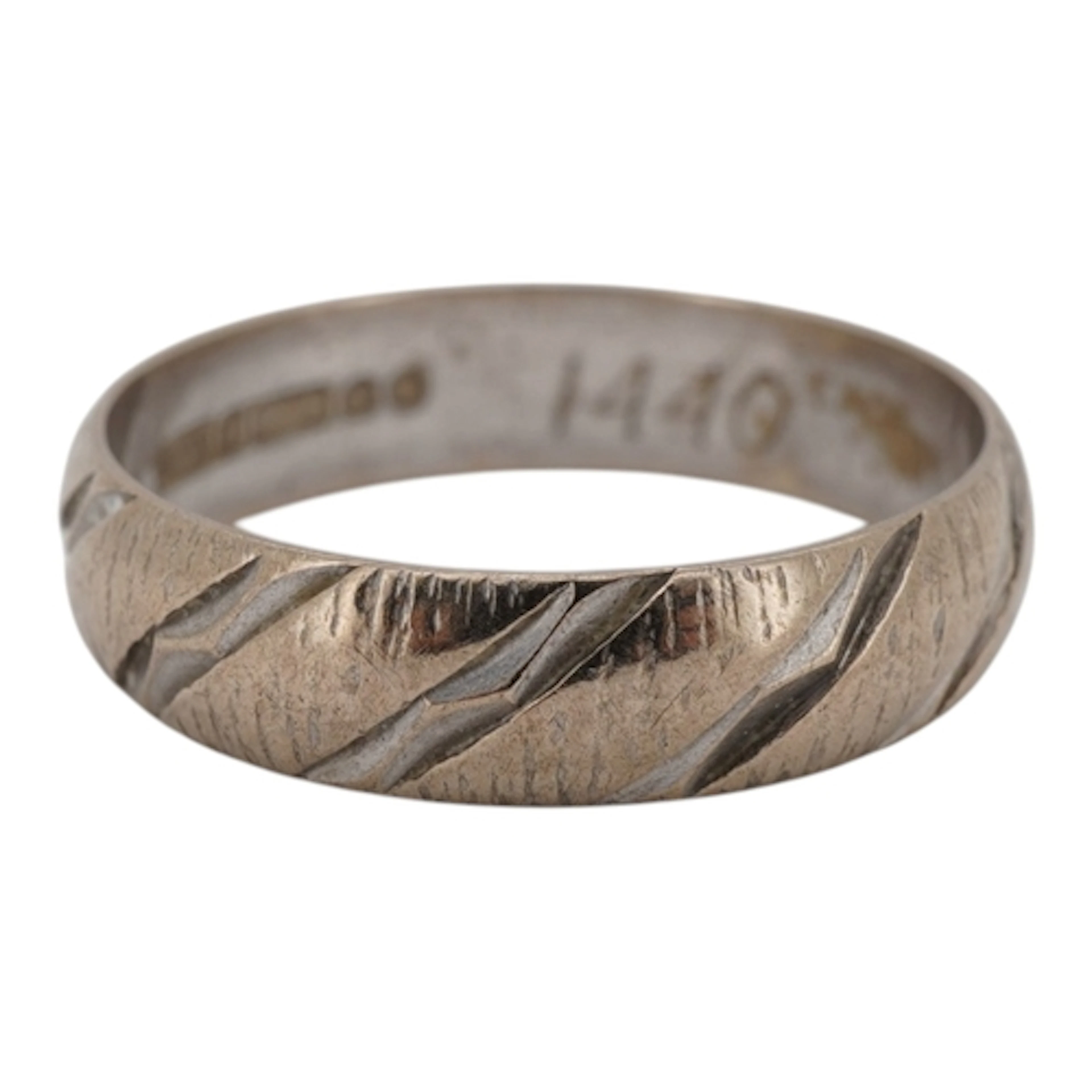 A 1970's spiral engraved 9ct white gold band, size P, 2.6 gr...