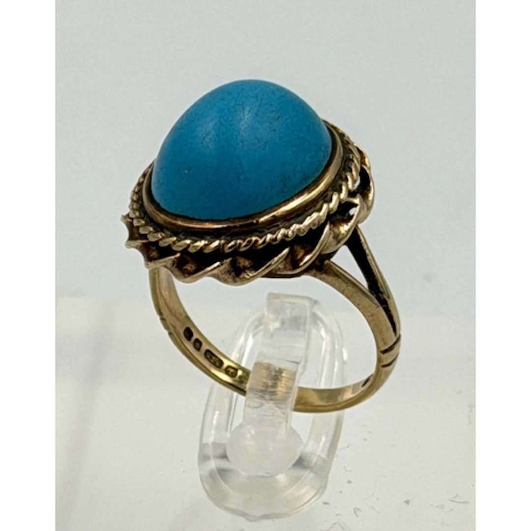A 9ct gold turquoise ring, approximate size L and weight 5g...