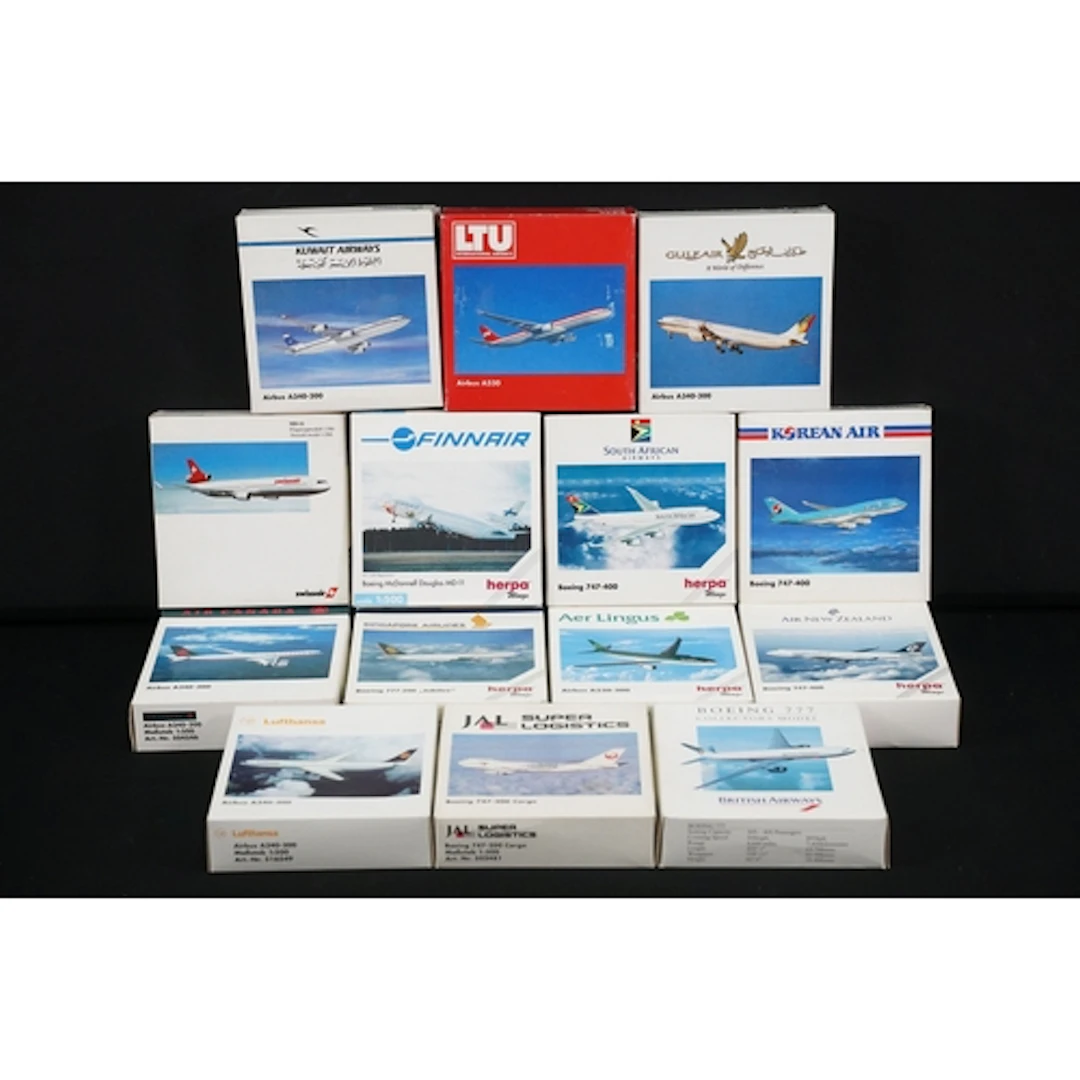 14 Boxed Herpa Wings 1/500 diecast model aircraft to include...