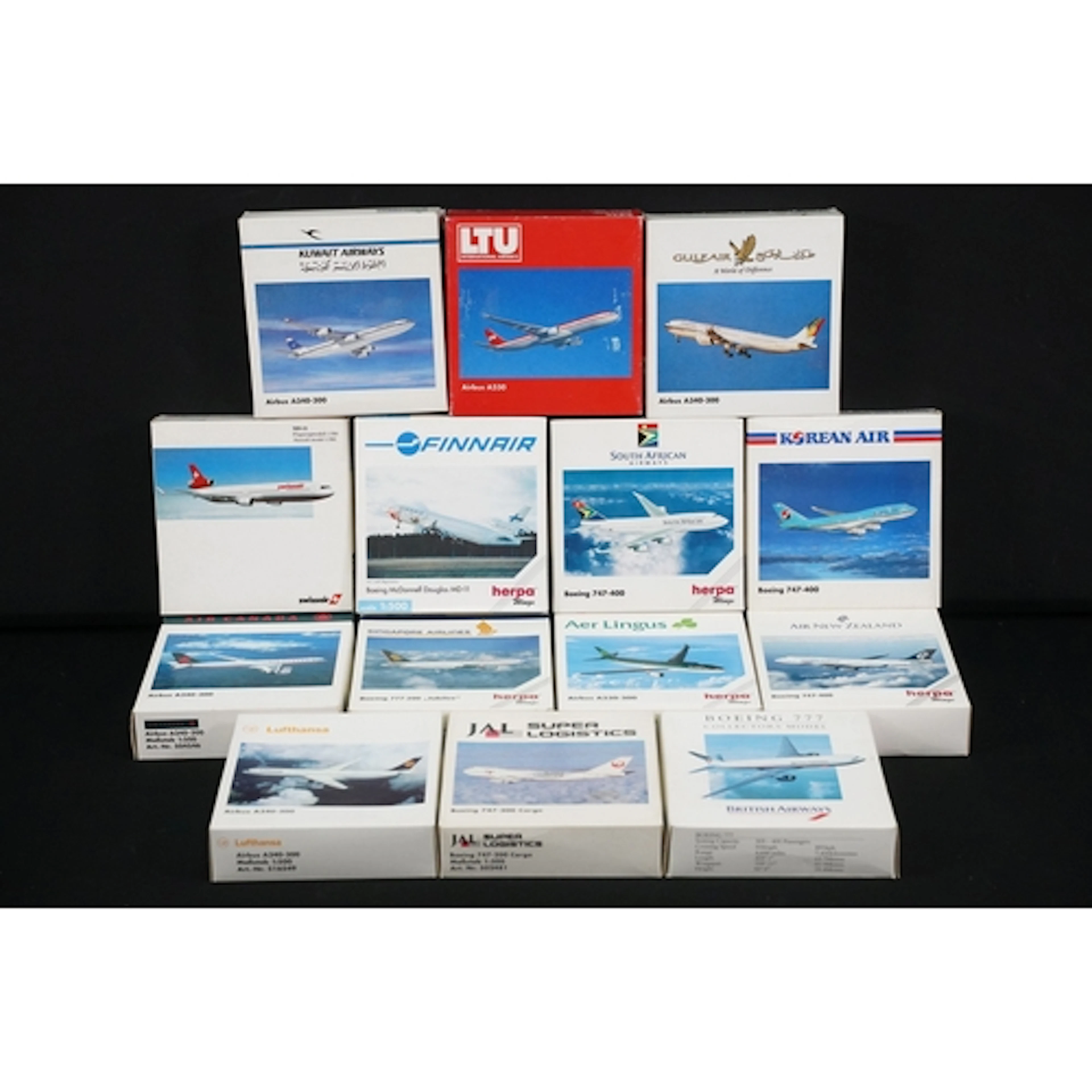 14 Boxed Herpa Wings 1/500 diecast model aircraft to include...
