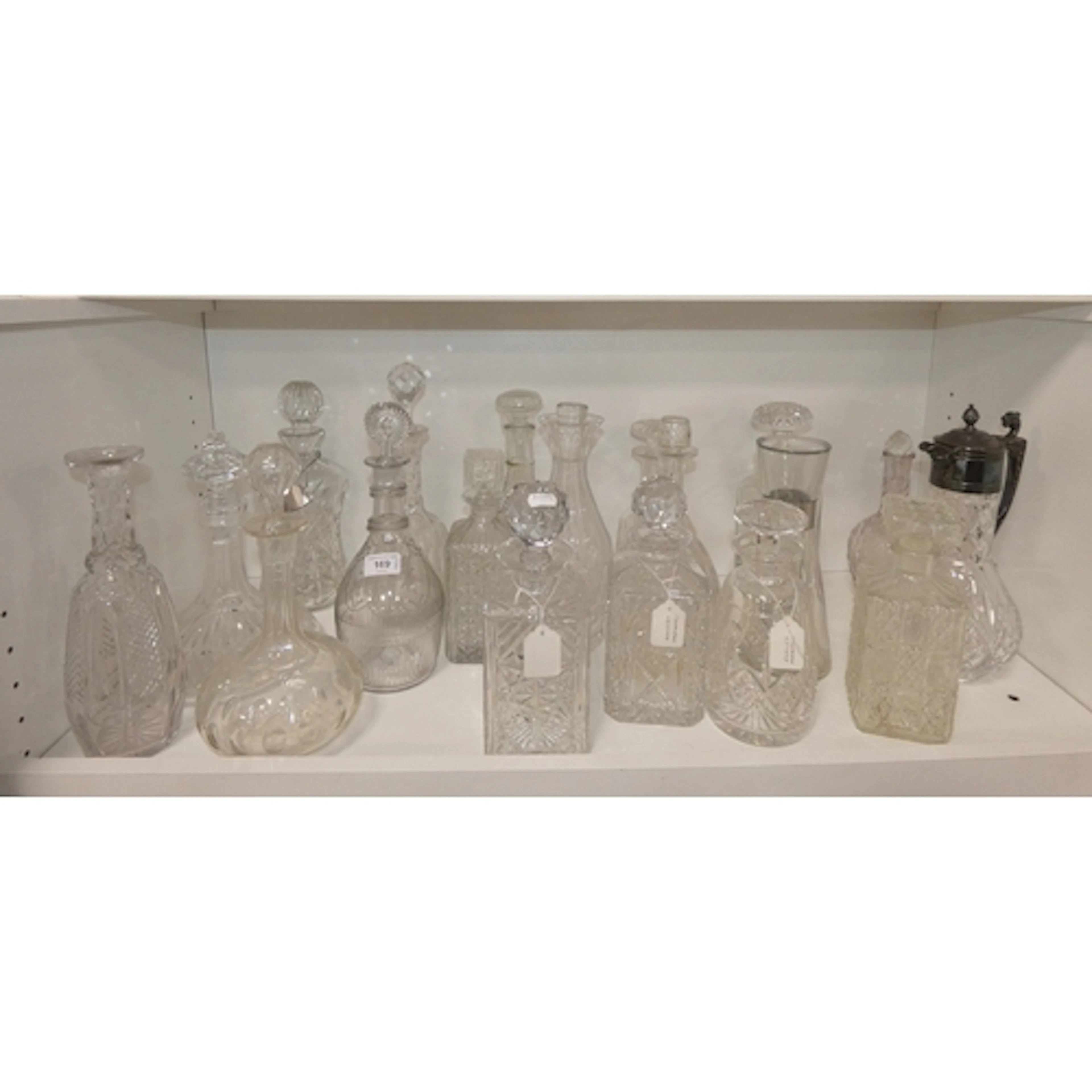 Cut glass and crystal decanters to include antique examples,...