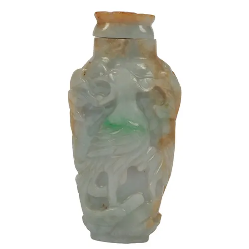 A Chinese jadeite 'phoenix and peony' snuff bottle and stopp...